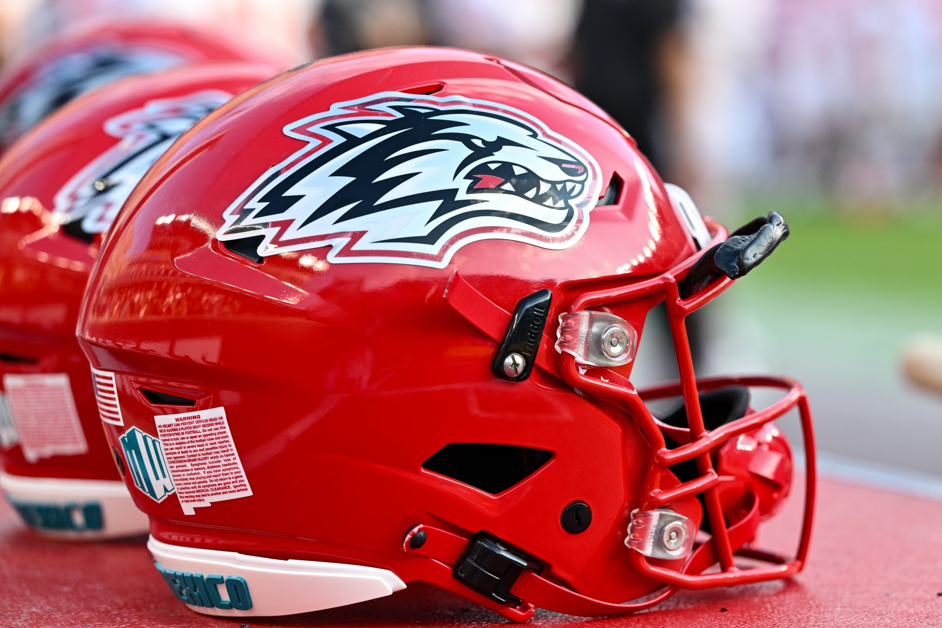 A detailed view of a New Mexico Lobos helmet on the sideline of the game against the Texas A&M Aggies at Kyle Field.