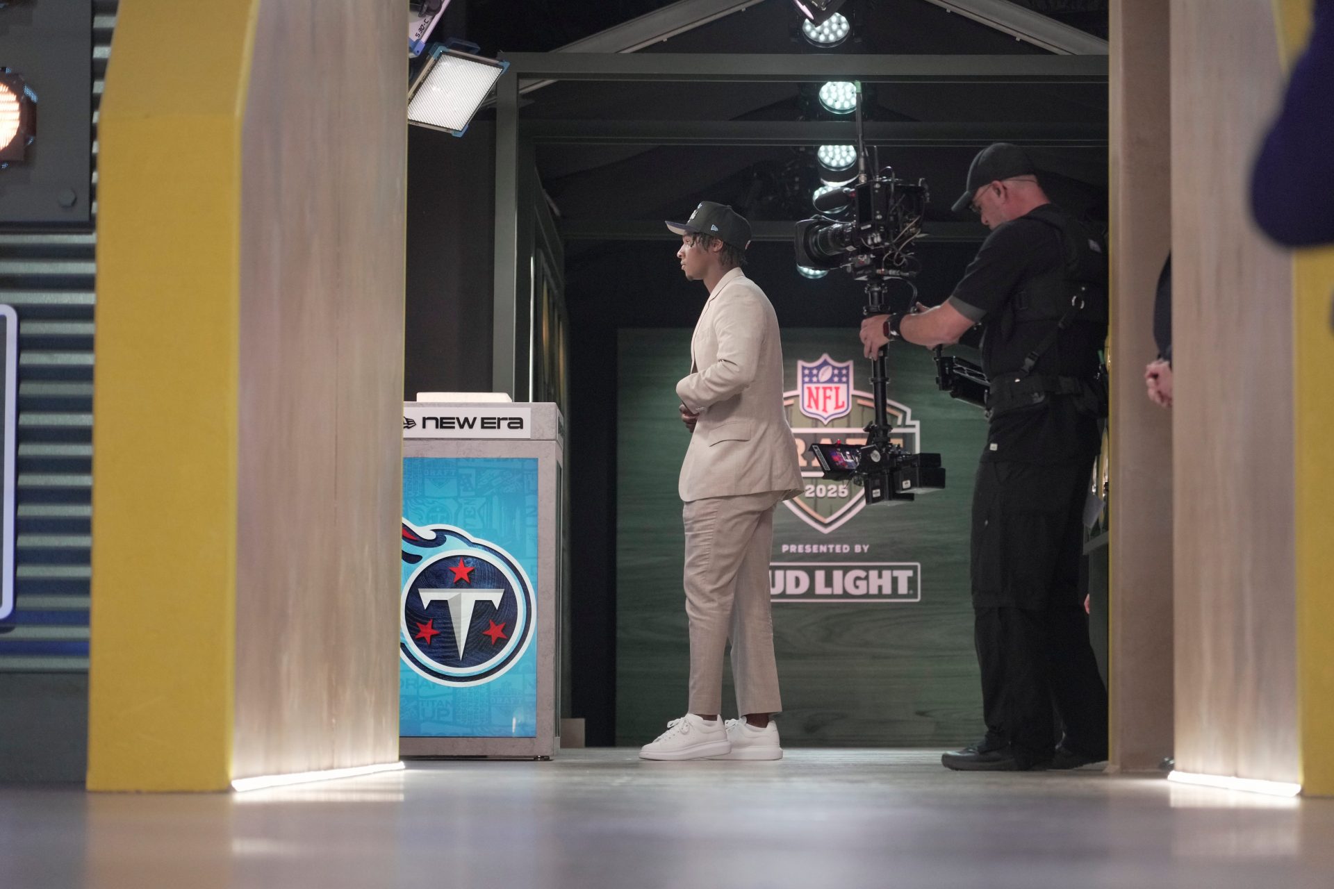 Quarterback Cam Ward from Miami poses after being selected 1st overall by the Tennessee Titans during the first round of the 2025 NFL Draft at Lambeau Field