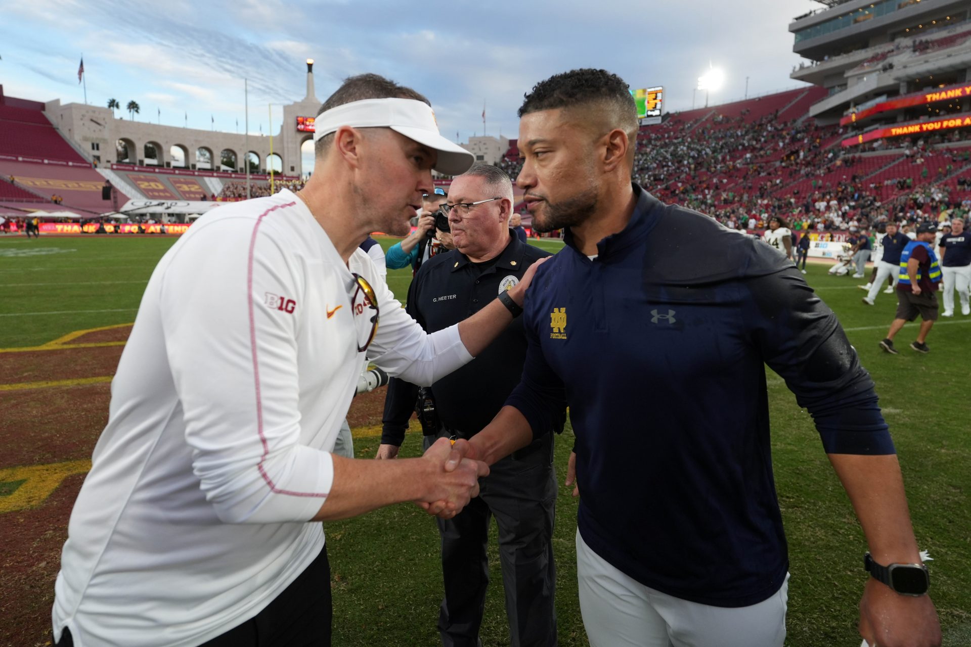 Southern California Trojans head coach Lincoln Riley and Notre Dame Fighting Irish head coach Marcus Freeman shake hands after the game at United Airlines Field at Los Angeles Memorial Coliseum.