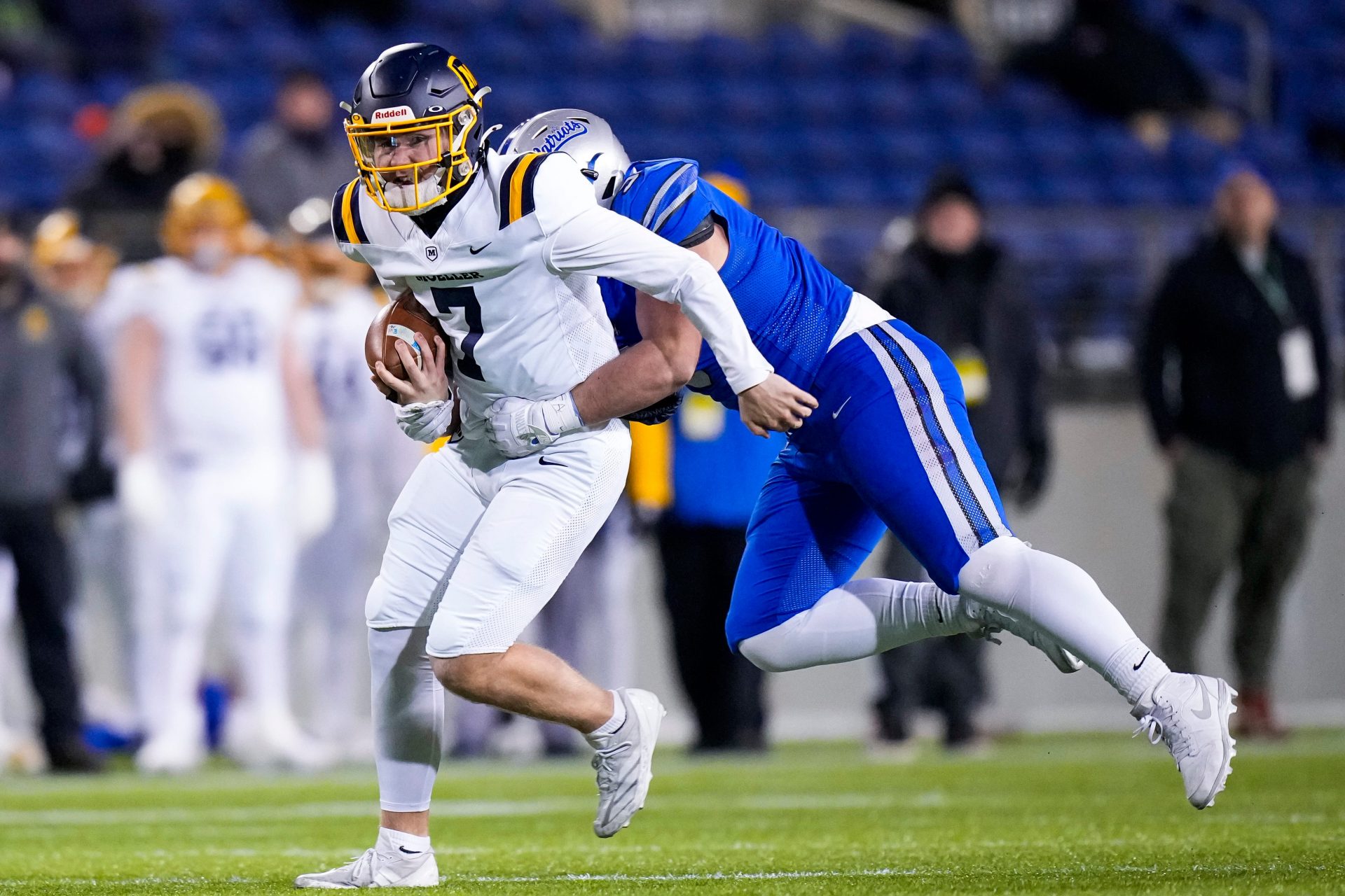 Cincinnati Moeller's Matt Ponatoski (7) runs the ball against Olentangy Liberty in the first half of the Division I State Championship game at Tom Benson Hall of Fame Stadium on Friday, Dec. 6, 2024 in Canton, Ohio.