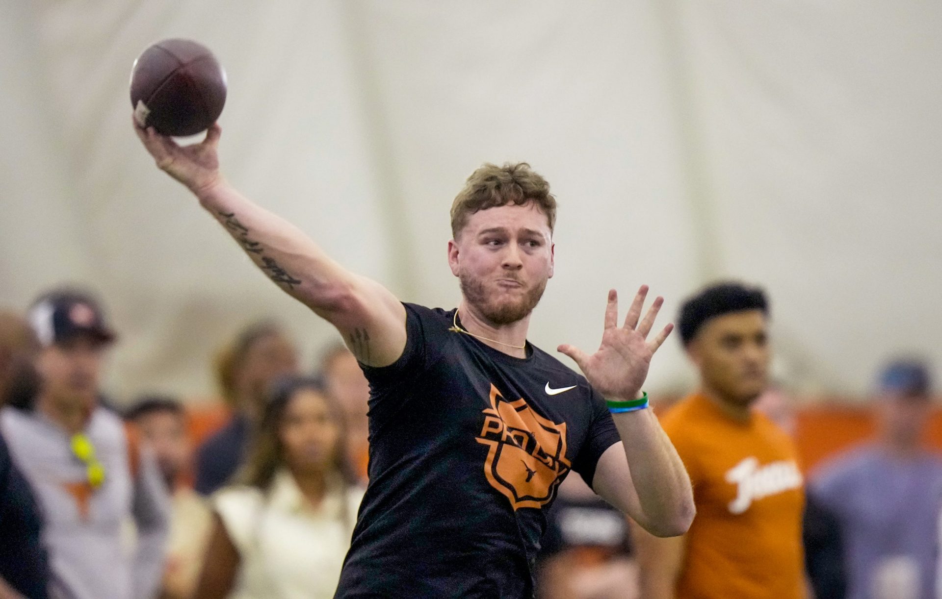 Former Longhorns Quinn Ewers passes during the Texas' Pro Day at the Texas Football Training Facility