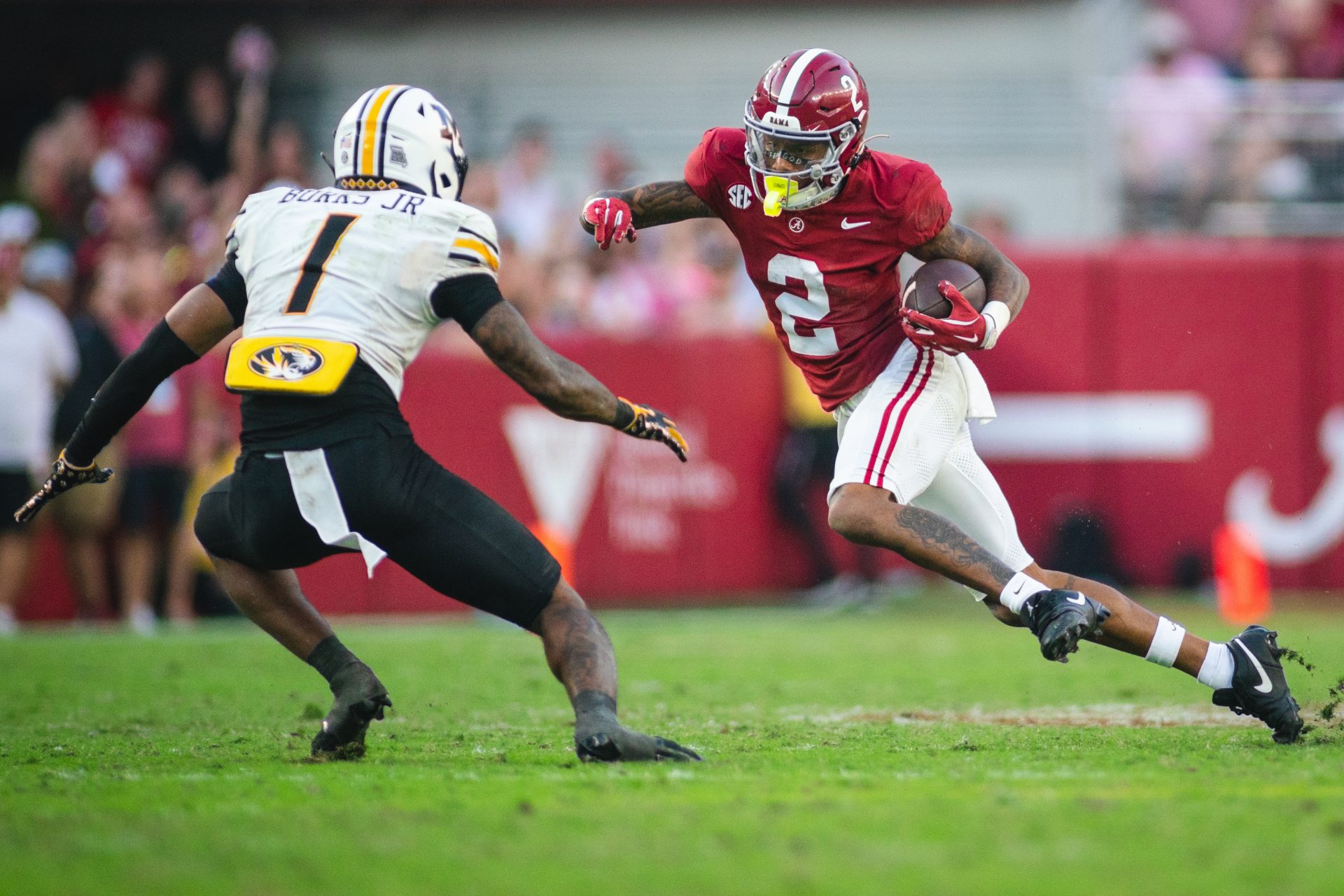 Alabama Crimson Tide wide receiver Ryan Williams (2) runs the ball against Missouri Tigers safety Marvin Burks Jr. (1) during the fourth quarter at Bryant-Denny Stadium.