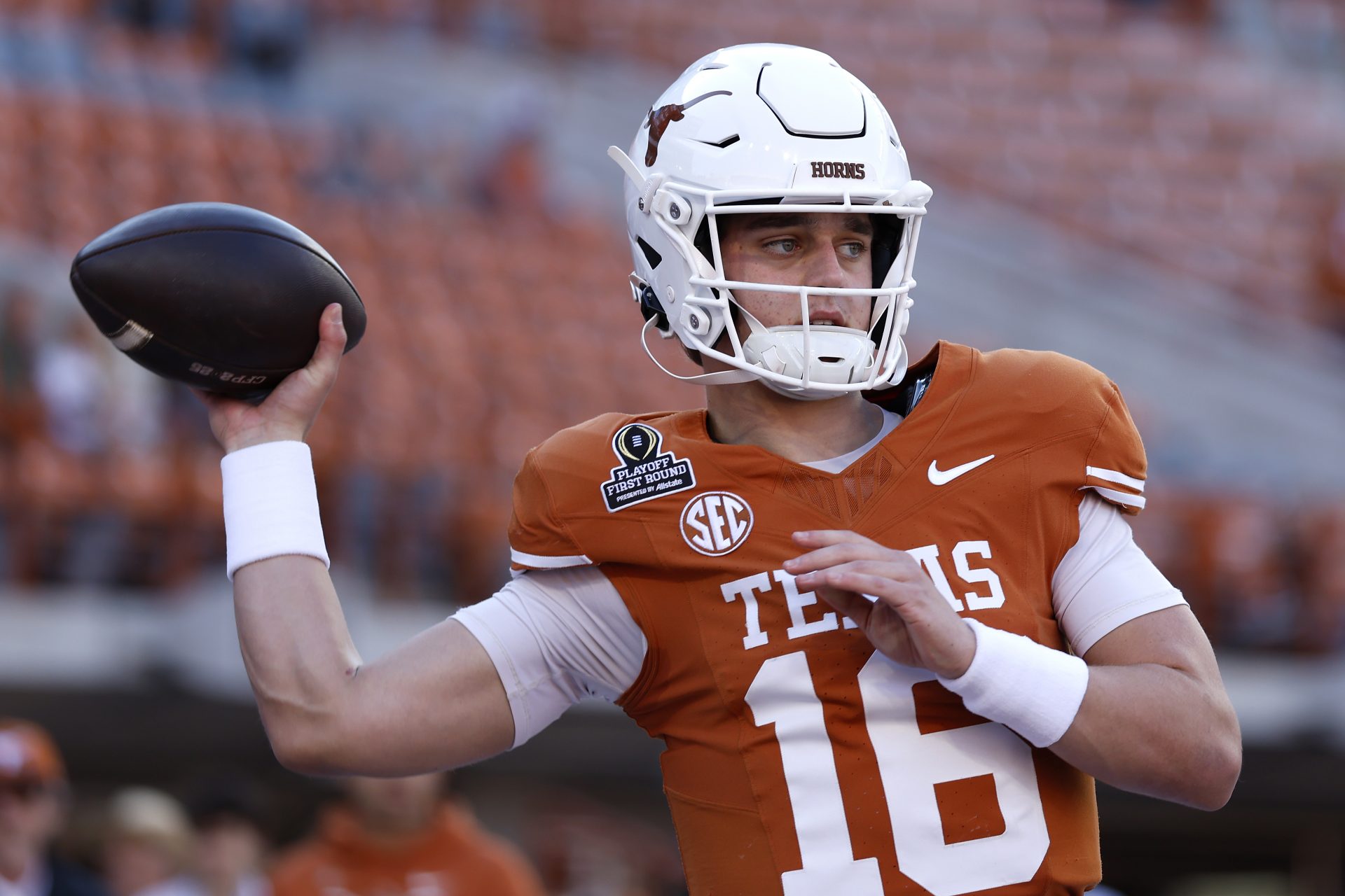AUSTIN, TEXAS - DECEMBER 21: Arch Manning #16 of the Texas Longhorns warms up prior to a game against the Clemson Tigers in the Playoff First Round Game at Darrell K Royal-Texas Memorial Stadium on December 21, 2024 in Austin, Texas. (Photo by Tim Warner/Getty Images)