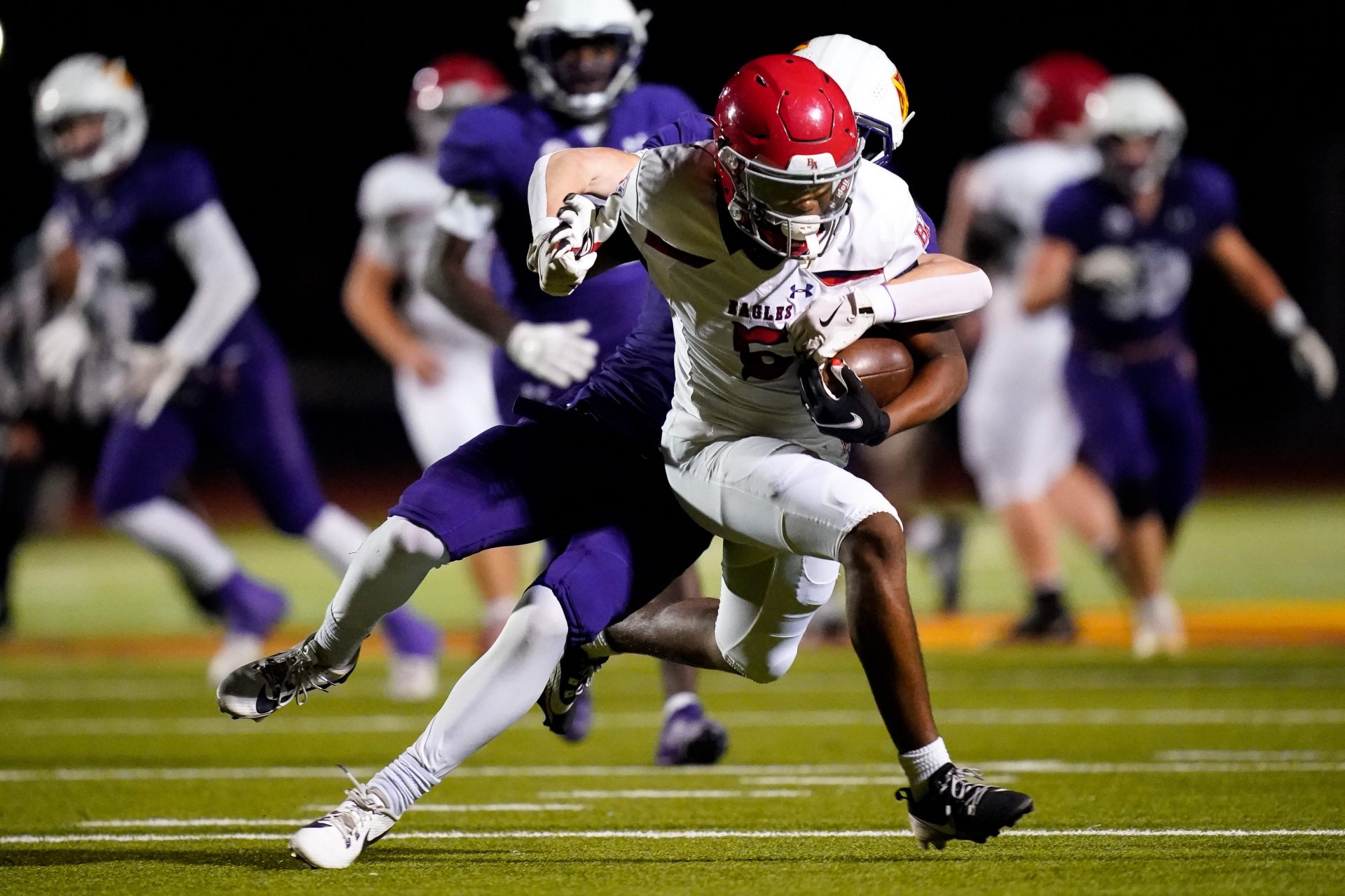 Brentwood Academy's Eli Ferguson (5) is stopped by Father Ryan's Jack Armour (5) during the third quarter at Father Ryan High School in Nashville, Tenn., Friday, Nov. 15, 2024.