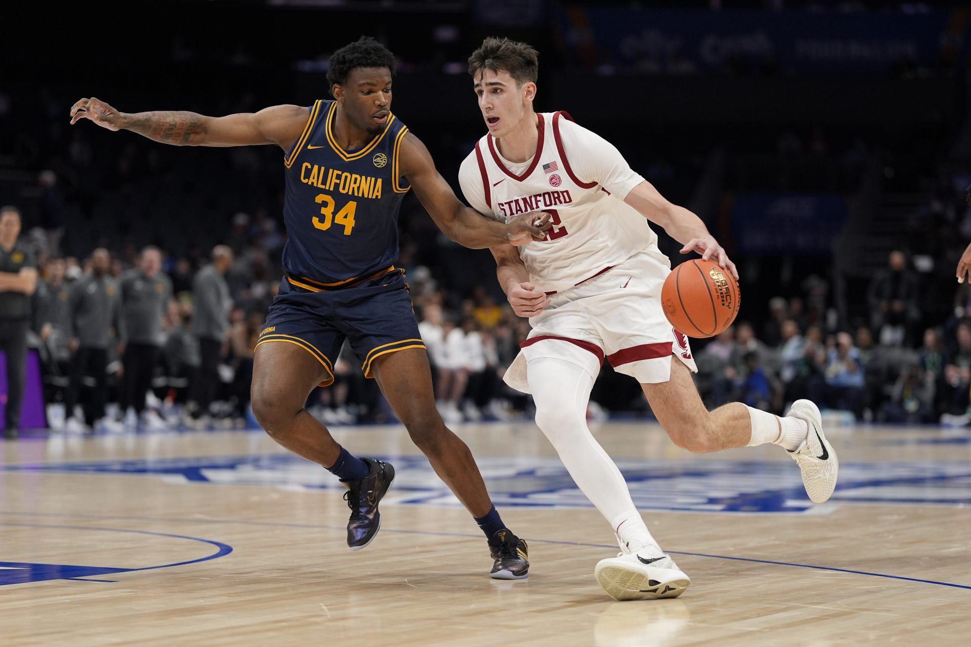 Stanford Cardinal forward Maxime Raynaud (42) drives to the basket against California Golden Bears forward Lee Dort (34) during the second half at Spectrum Center.