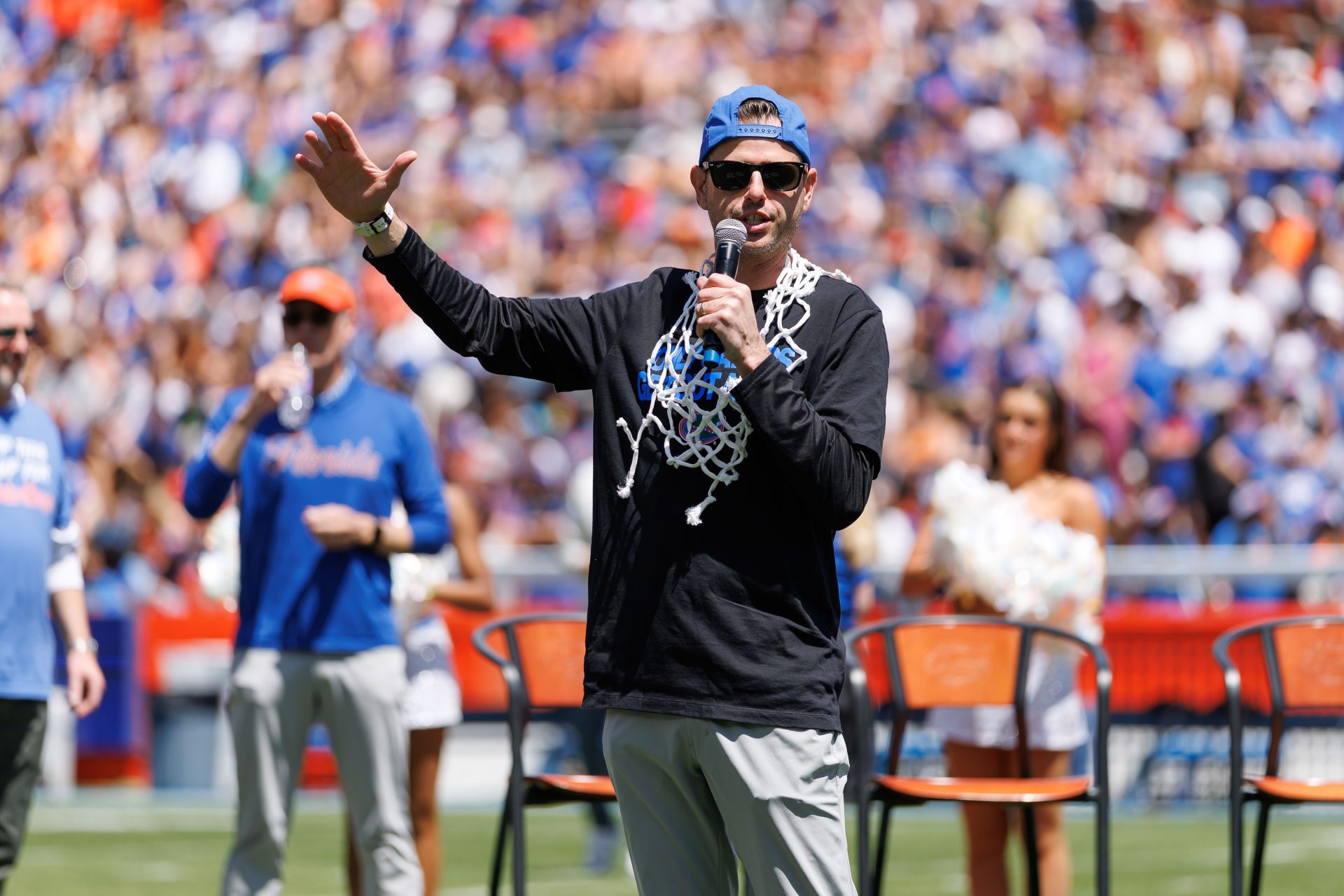 Florida Gators head coach Todd Golden gestures while speaking to the crowd during the National Championship celebration at Ben Hill Griffin Stadium.