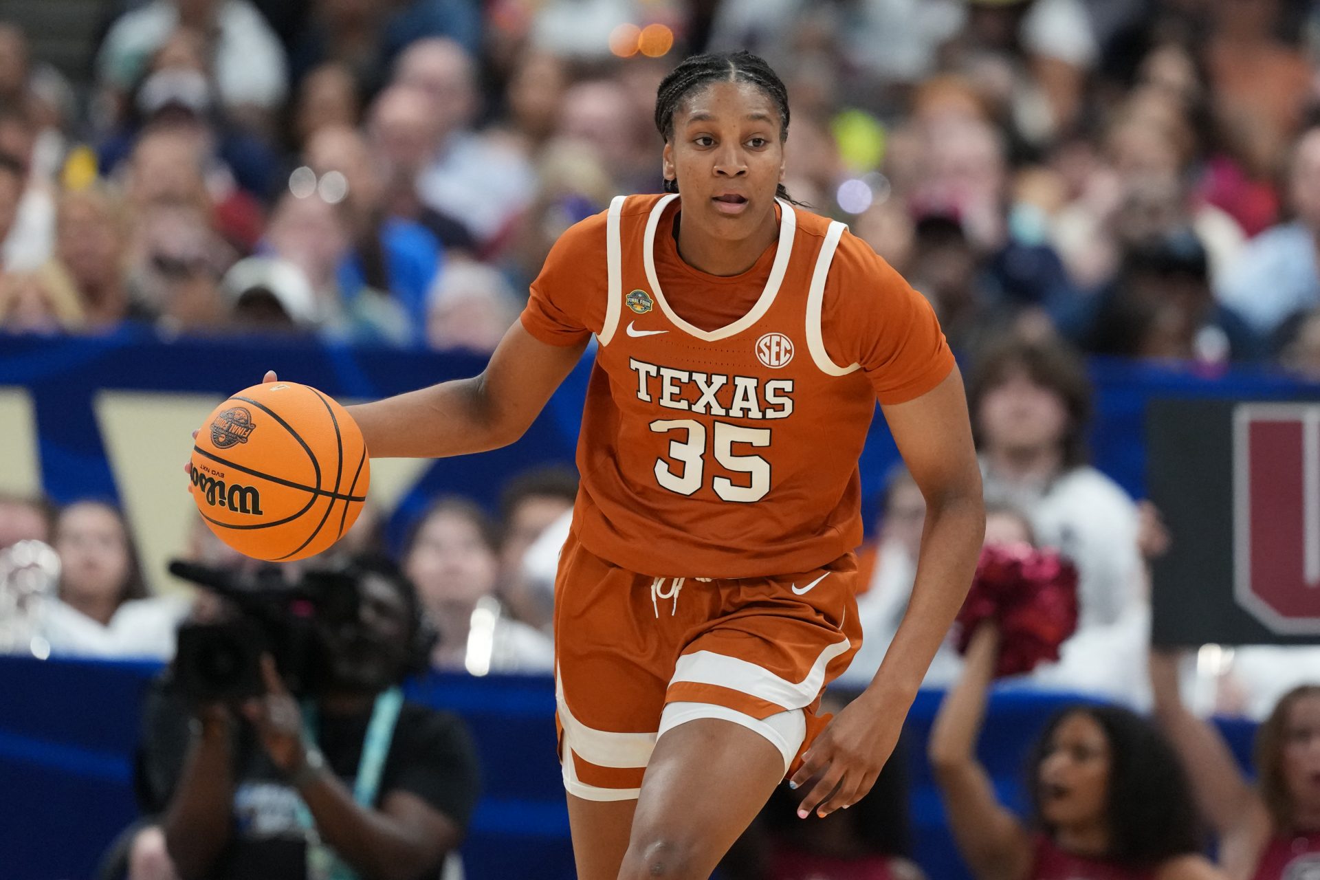 Texas Longhorns forward Madison Booker (35) dribbles against the South Carolina Gamecocks during the third quarter in a semifinal of the women's 2025 NCAA tournament at Amalie Arena.