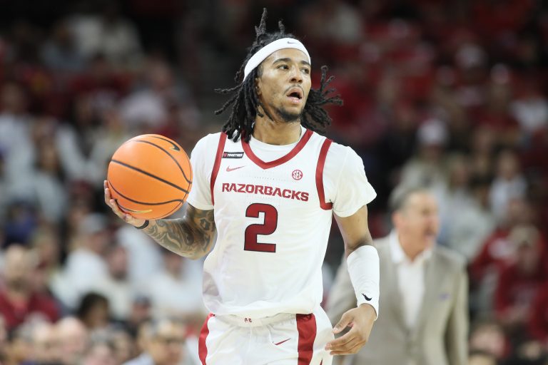 Arkansas Razorbacks guard Boogie Fland (2) dribbles during the first half against the Florida Gators at Bud Walton Arena.
