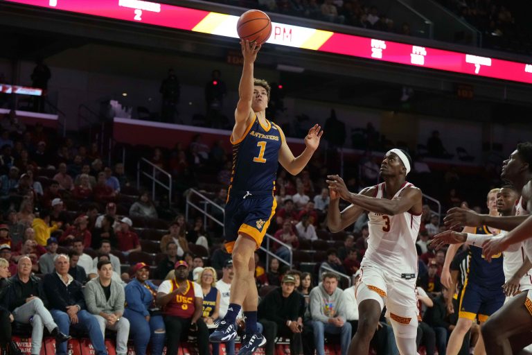 UC Irvine Anteaters guard Derin Saran (1) shoots the ball against Southern California Trojans forward Vincent Iwuchukwu (3) in the first half at Galen Center.
