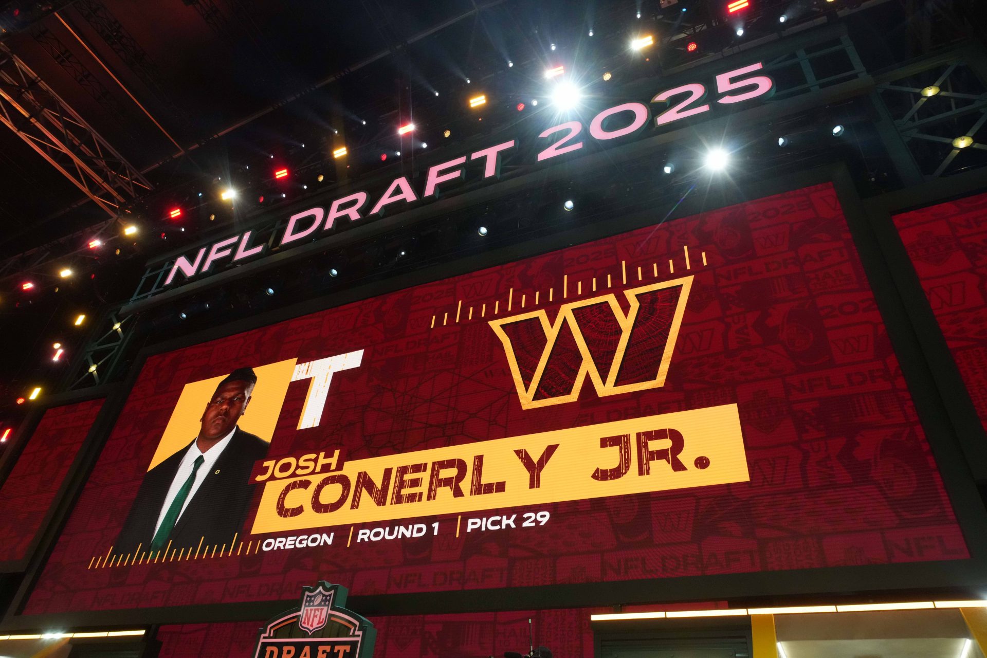 Oregon Ducks tackle Josh Conerly Jr. is selected as the No. 29 pick by the Washington Commanders during the NFL Draft at Lambeau Field