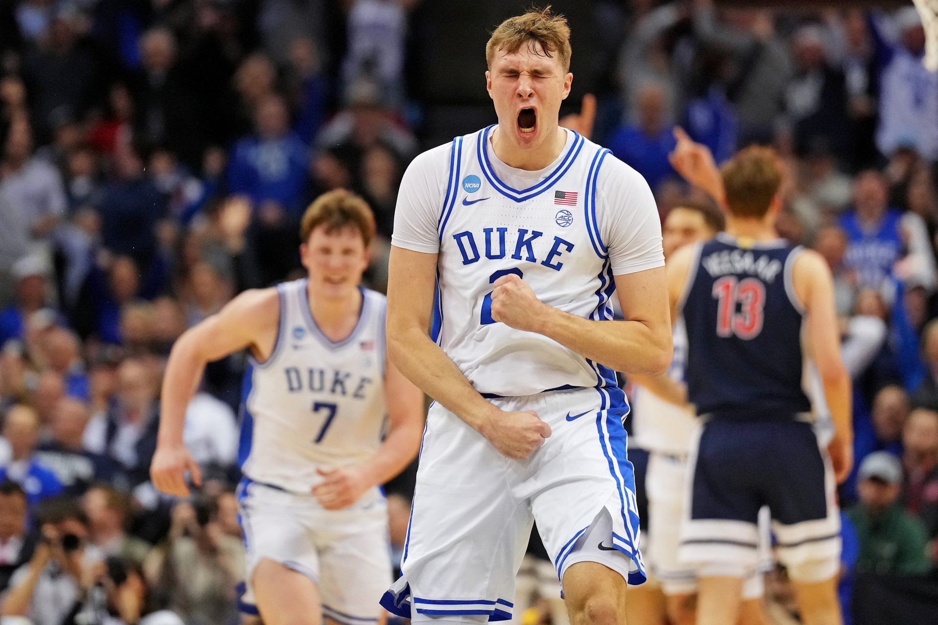 Duke Blue Devils forward Cooper Flagg (2) reacts after making a last second shot to end the first half against the Arizona Wildcats during an East Regional semifinal of the 2025 NCAA tournament at Prudential Center.