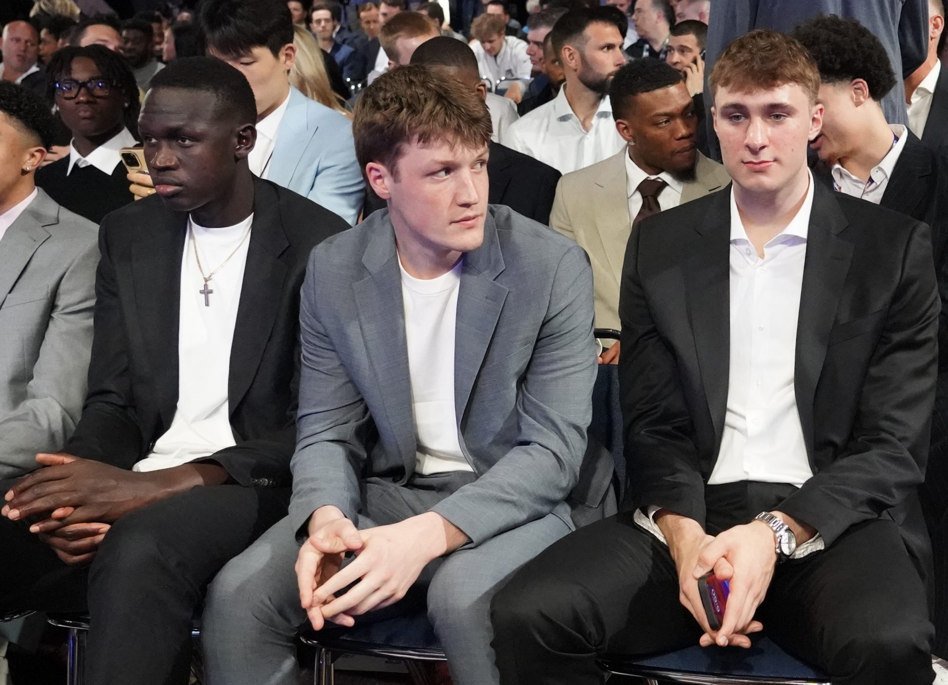 Duke players R-L Cooper Flagg, Kon Knueppel,and Khaman Maluach. during the 2025 NBA Draft Lottery at McCormick Place.