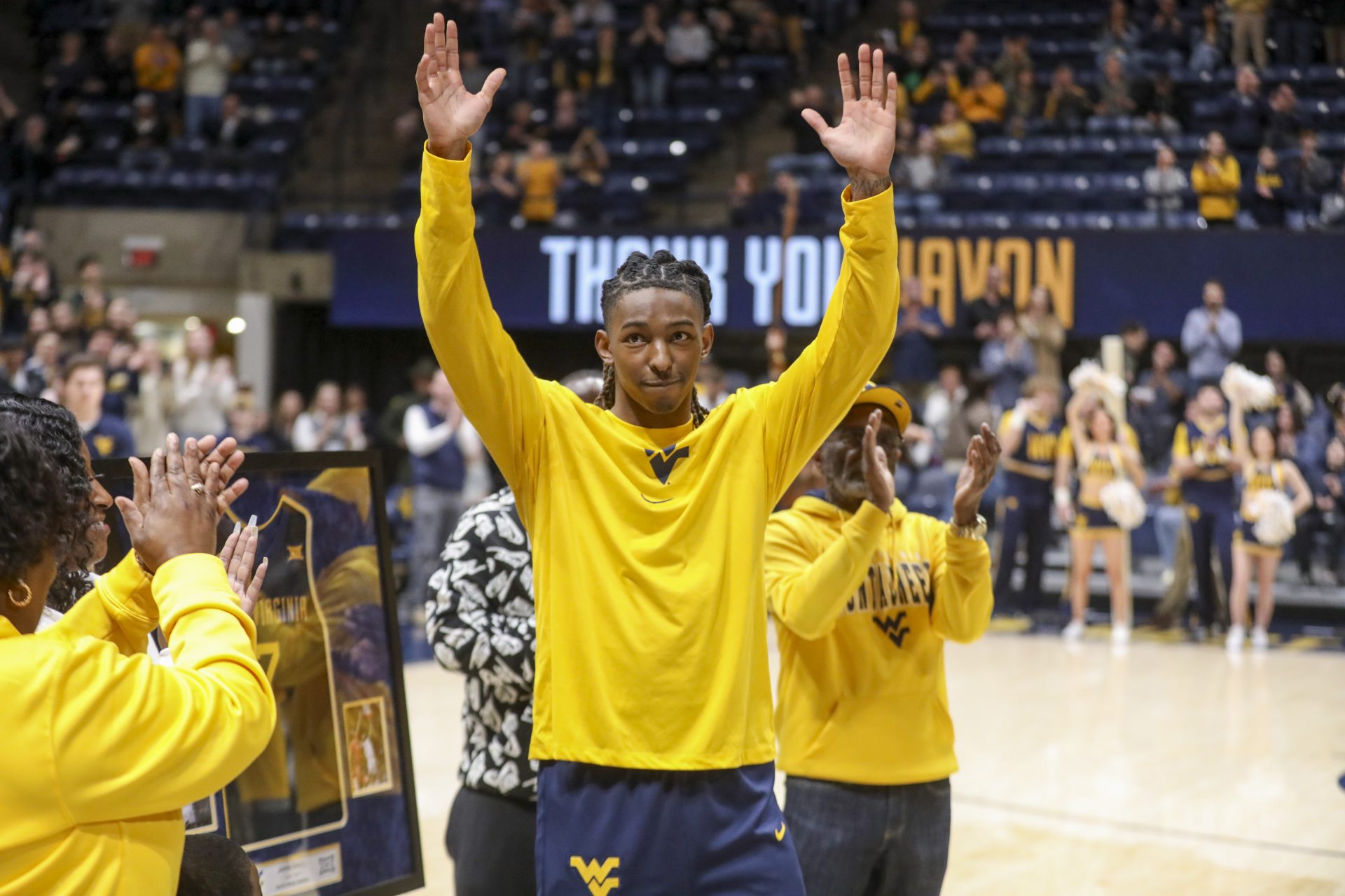 West Virginia Mountaineers guard Javon Small (7) waives to the crowd during Senior Day ceremonies before their game against the UCF Knights at WVU Coliseum.