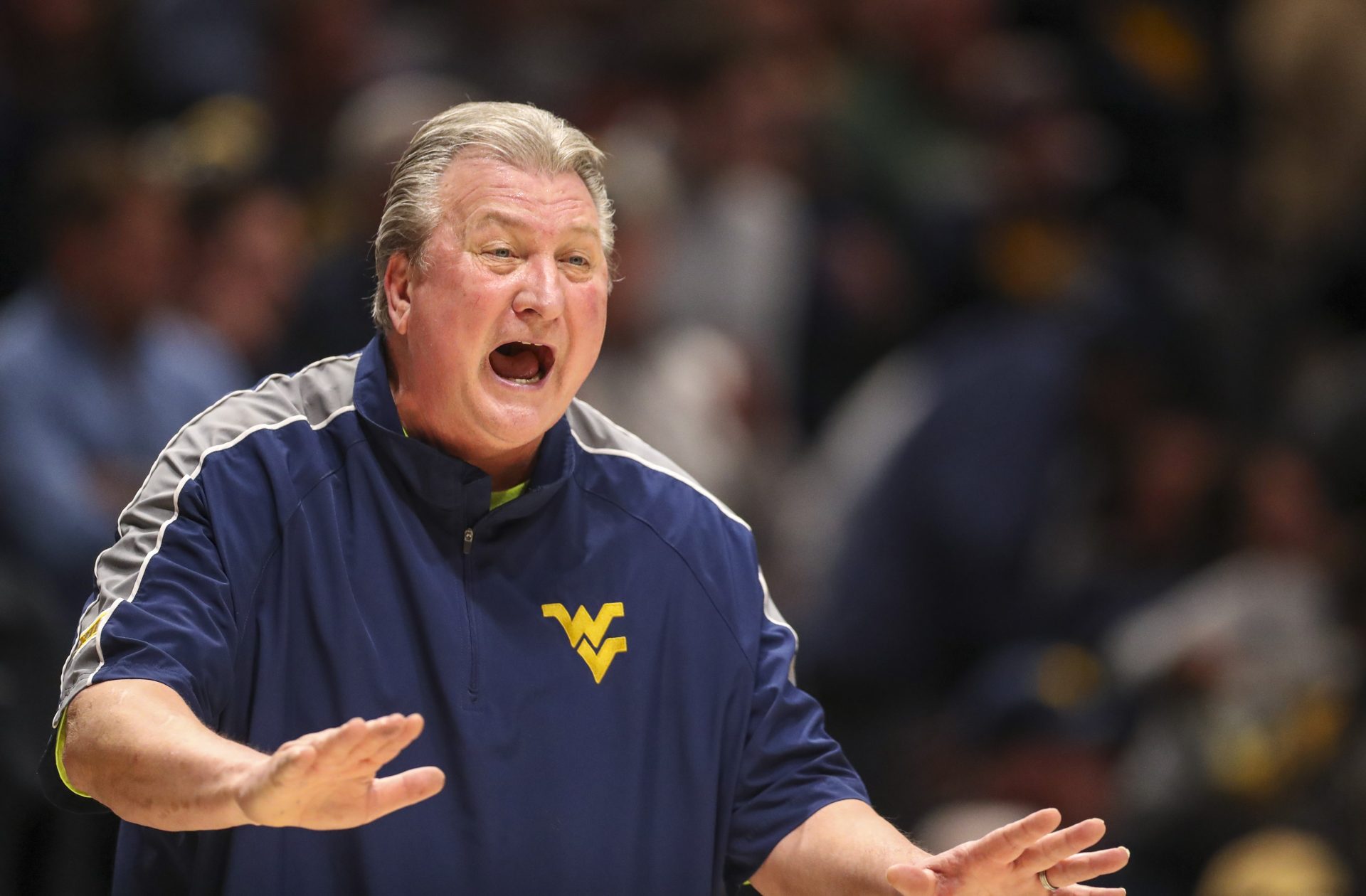 West Virginia Mountaineers head coach Bob Huggins yells during the first half against the Kansas State Wildcats at WVU Coliseum.
