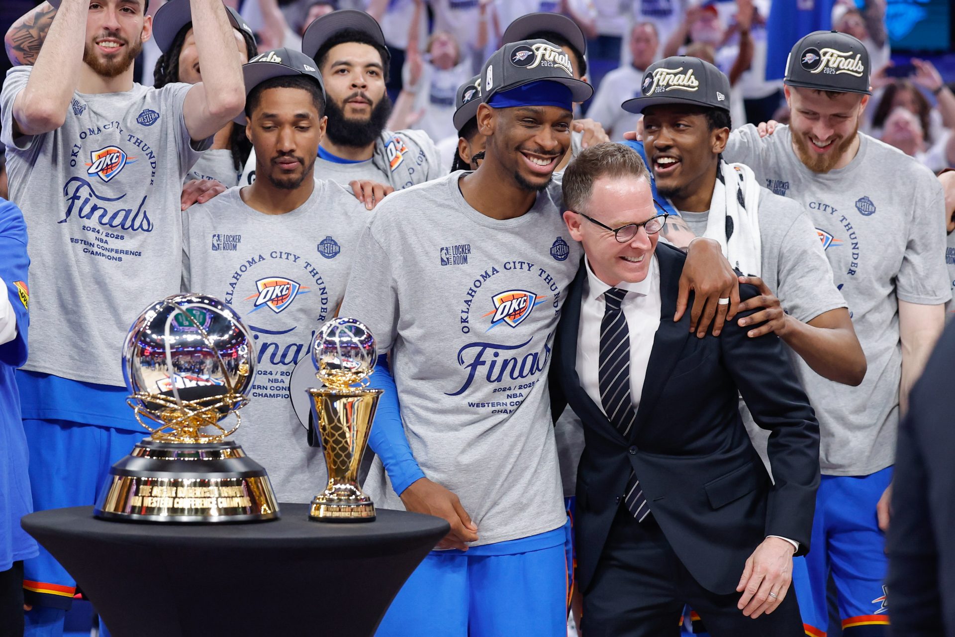 Oklahoma City Thunder guard Shai Gilgeous-Alexander hugs Oklahoma City Thunder executive vice president and general manager Sam Presti after their team defeated the Minnesota Timberwolves in game five of the western conference finals for the 2025 NBA Playoffs at Paycom Center.
