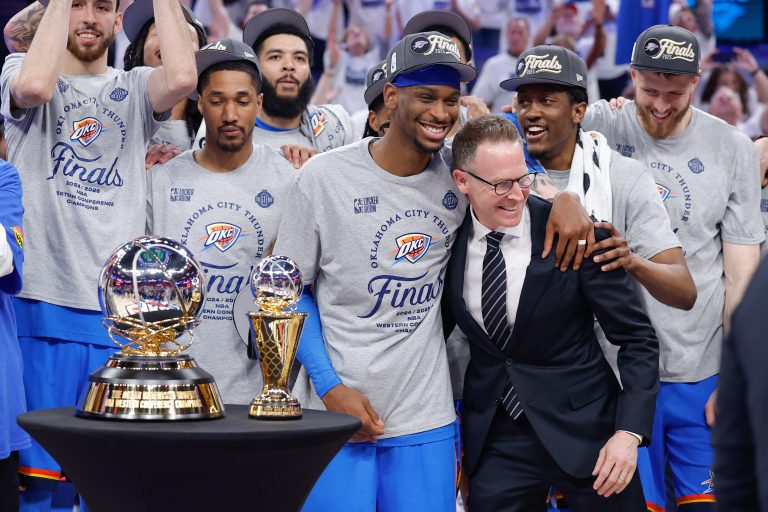 Oklahoma City Thunder guard Shai Gilgeous-Alexander hugs Oklahoma City Thunder executive vice president and general manager Sam Presti after their team defeated the Minnesota Timberwolves in game five of the western conference finals for the 2025 NBA Playoffs at Paycom Center.
