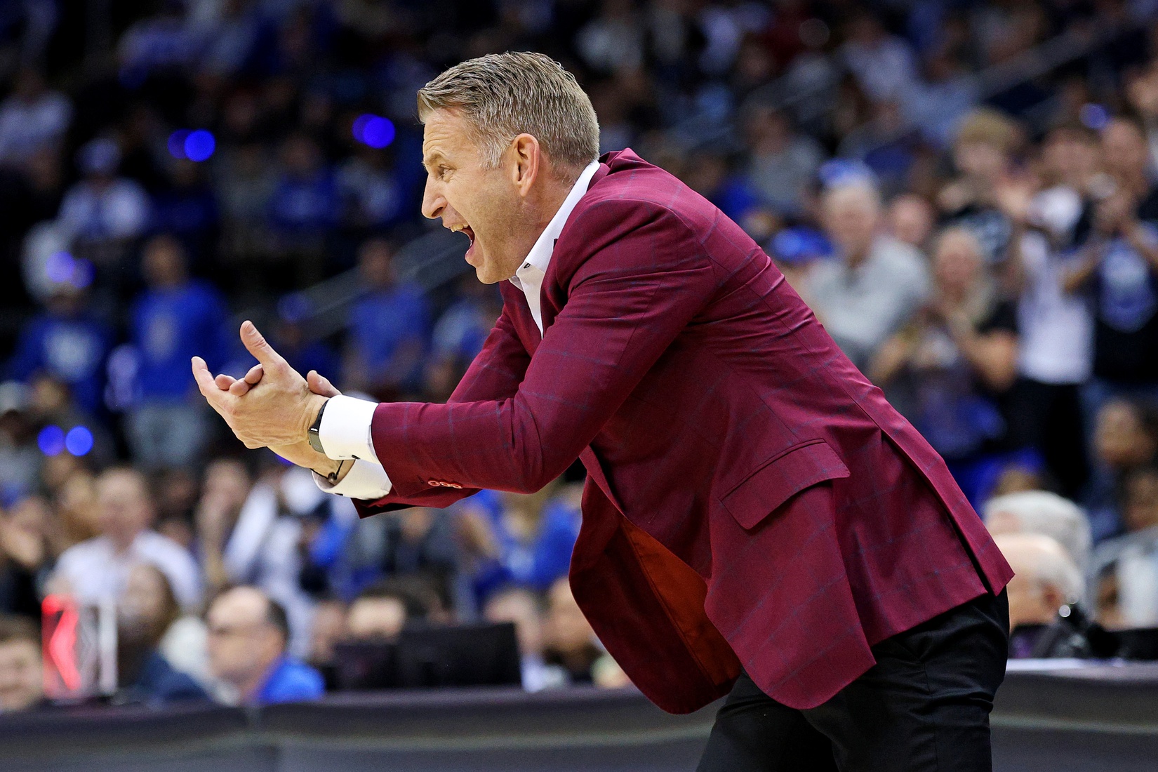 Alabama Crimson Tide head coach Nate Oats calls to his team during the first half against the Duke Blue Devils in the East Regional final of the 2025 NCAA tournament at Prudential Center.