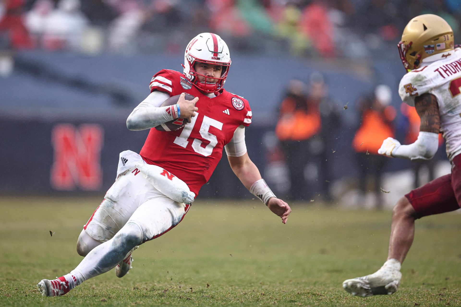 Nebraska Cornhuskers quarterback Dylan Raiola (15) slides during the second half against the Boston College Eagles at Yankee Stadium.
