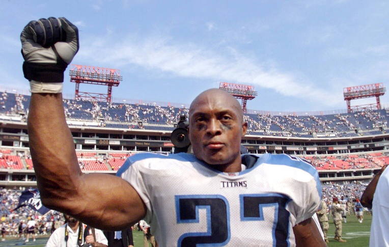 Tennessee Titans running back Eddie George pumps his fist as he walks off the field after the they defeated the Philadelphia Eagles 27 to 24 in their home and season opener at the Adelphia Coliseum on Sept. 8, 2002.