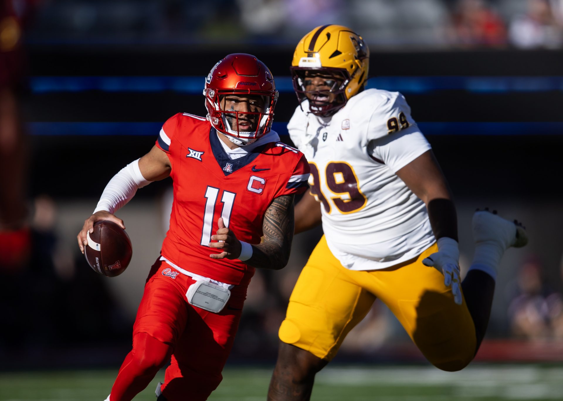 Arizona Wildcats quarterback Noah Fifita (11) against the Arizona State Sun Devils during the Territorial Cup at Arizona Stadium.