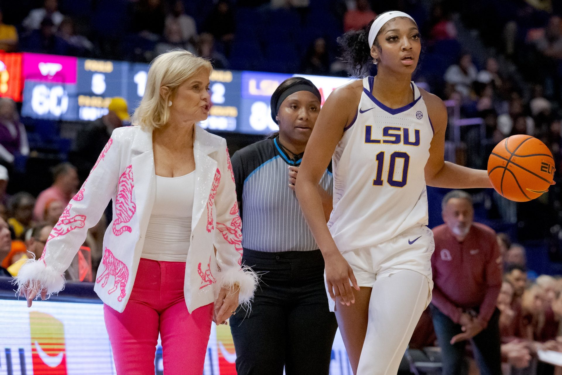 LSU Lady Tigers head coach Kim Mulkey calls out to LSU Lady Tigers forward Angel Reese (10) during the second half against the Virginia Tech Hokies at Pete Maravich Assembly Center.