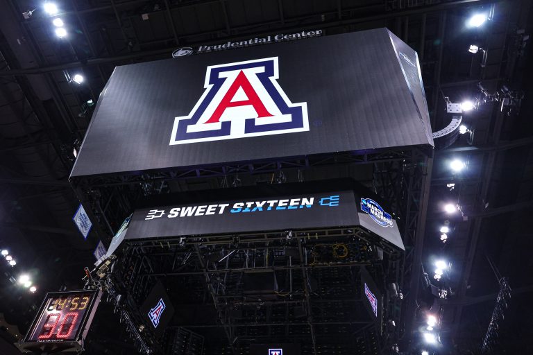An Arizona Wildcats logo on the main scoreboard during a practice session in preparation for an East Regional semifinal game against the Duke Blue Devils at Prudential Center.
