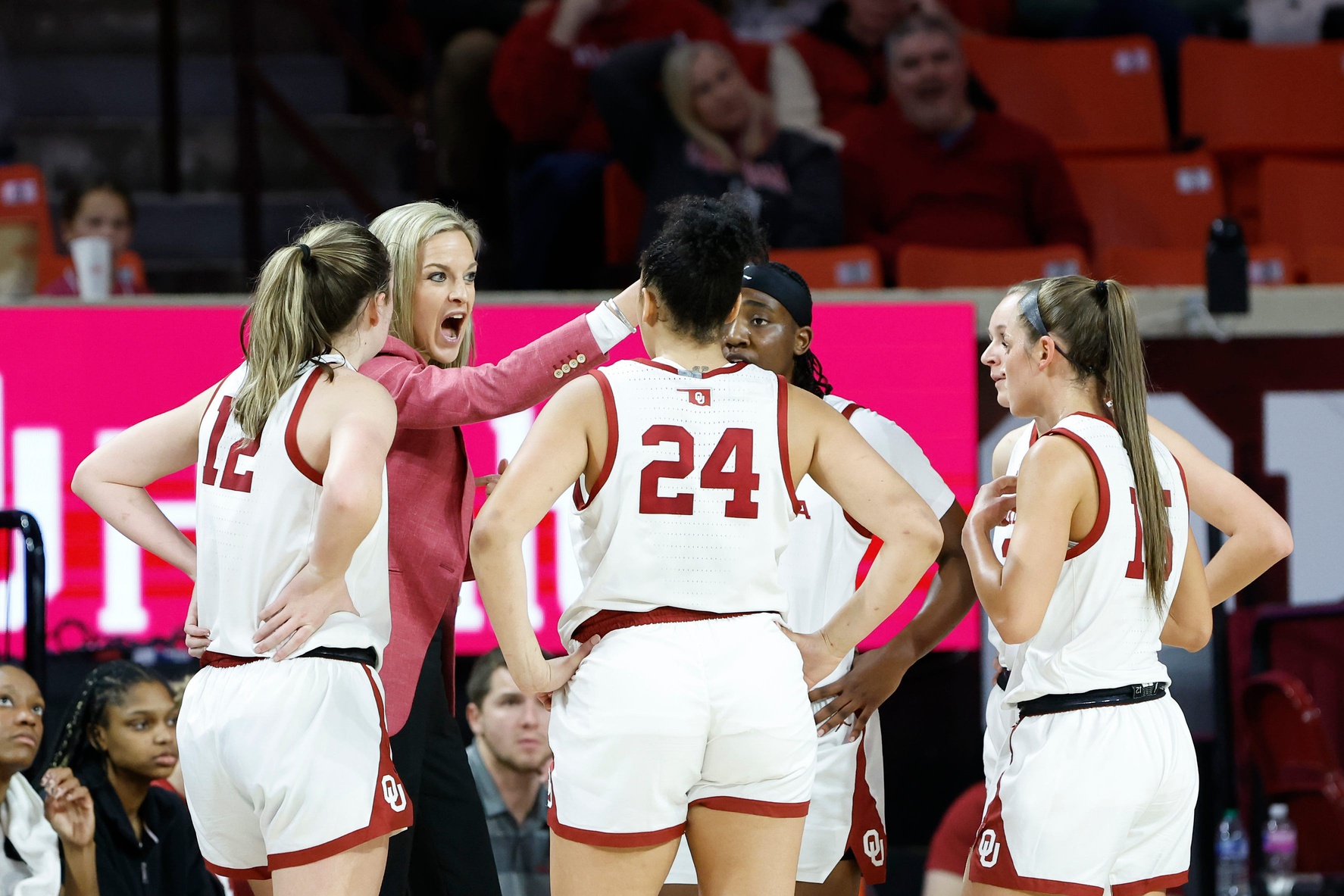 Oklahoma Sooners head coach Jennie Baranczyk talks to her team during a time out in the first quarter of an NCAA Women's Basketball game against the UCF Knights at Lloyd Noble Center in Norman, Okla., Saturday, Dec. 30, 2023.
