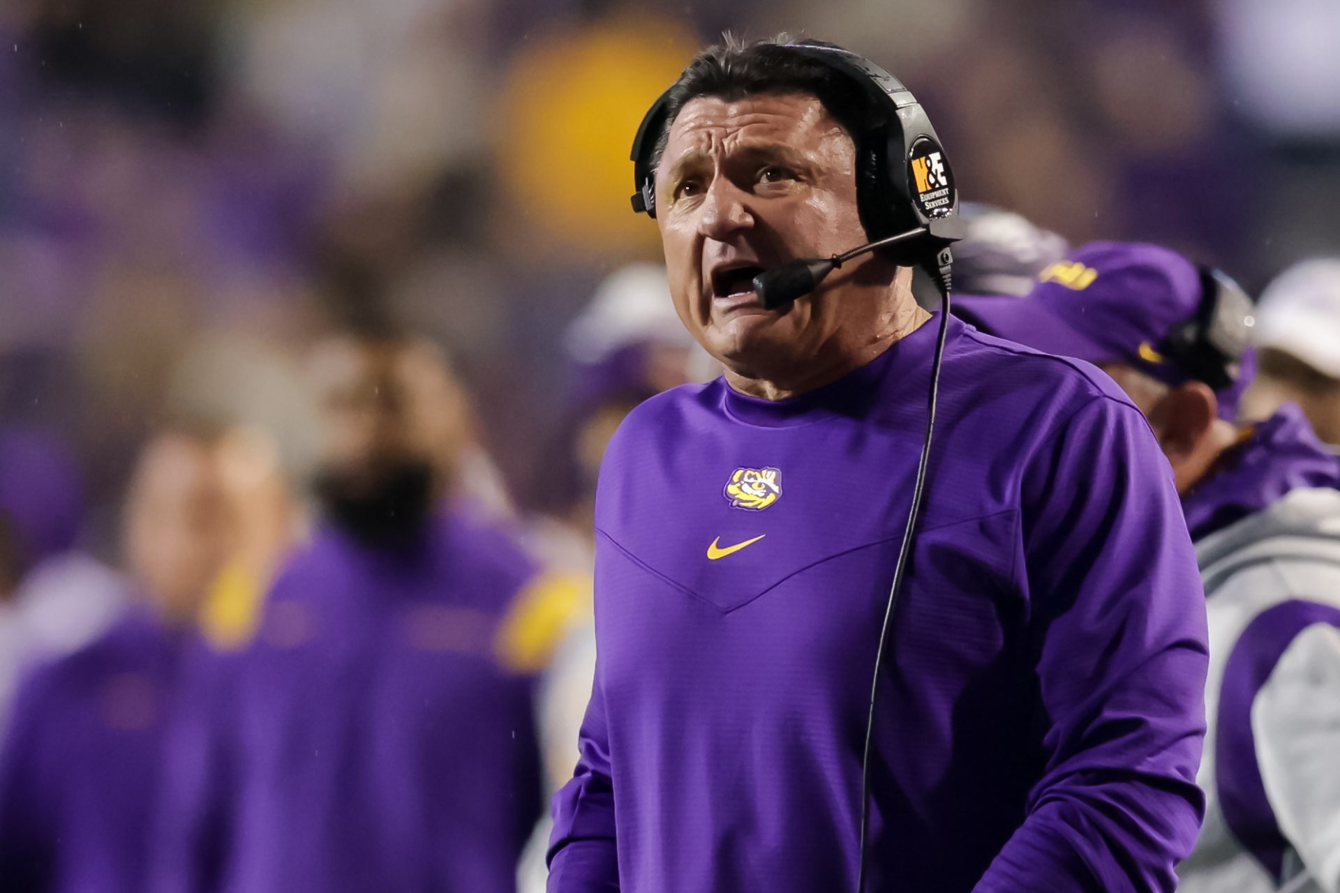 LSU Tigers head coach Ed Orgeron looks on during the first half against the Texas A&M Aggies at Tiger Stadium.