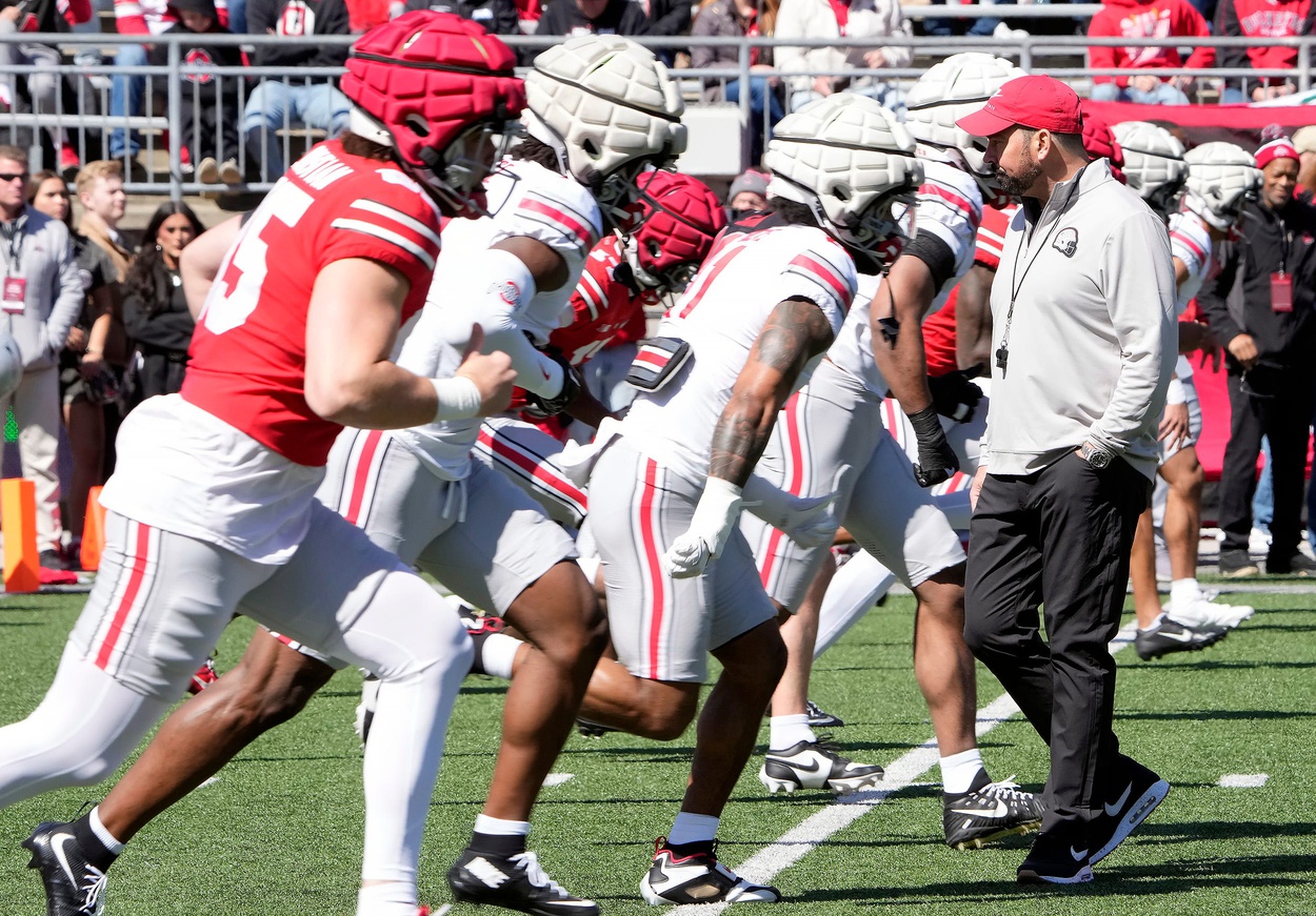 Ohio State Buckeye head coach Ryan Day watches his team warm up before the start of the spring game at Ohio Stadium on April 12, 2025.