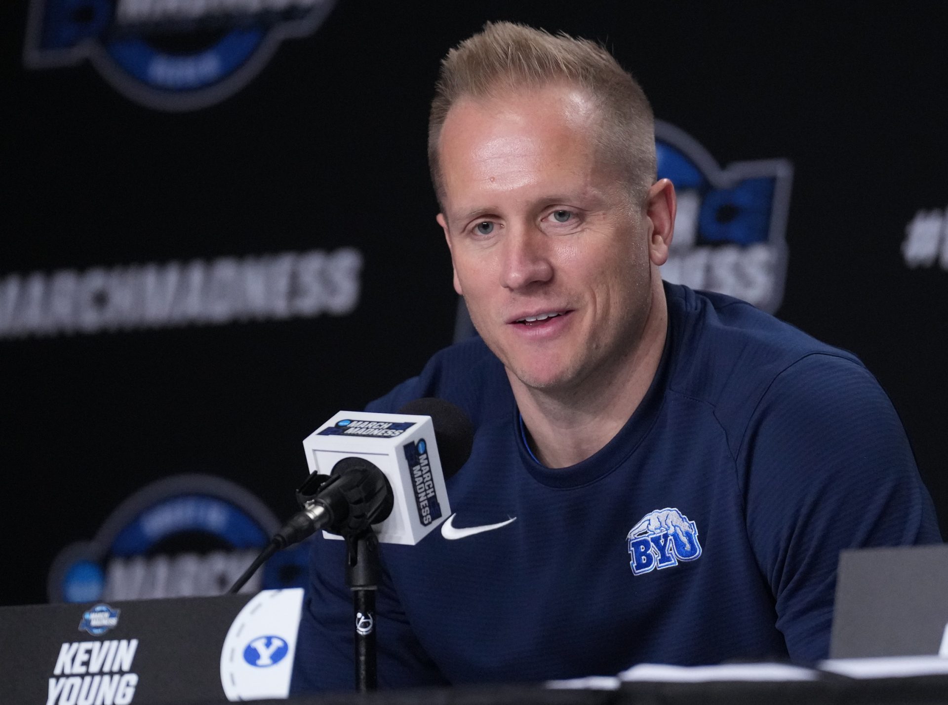 Brigham Young Cougars head coach Kevin Young talks to the media at the Prudential Center.