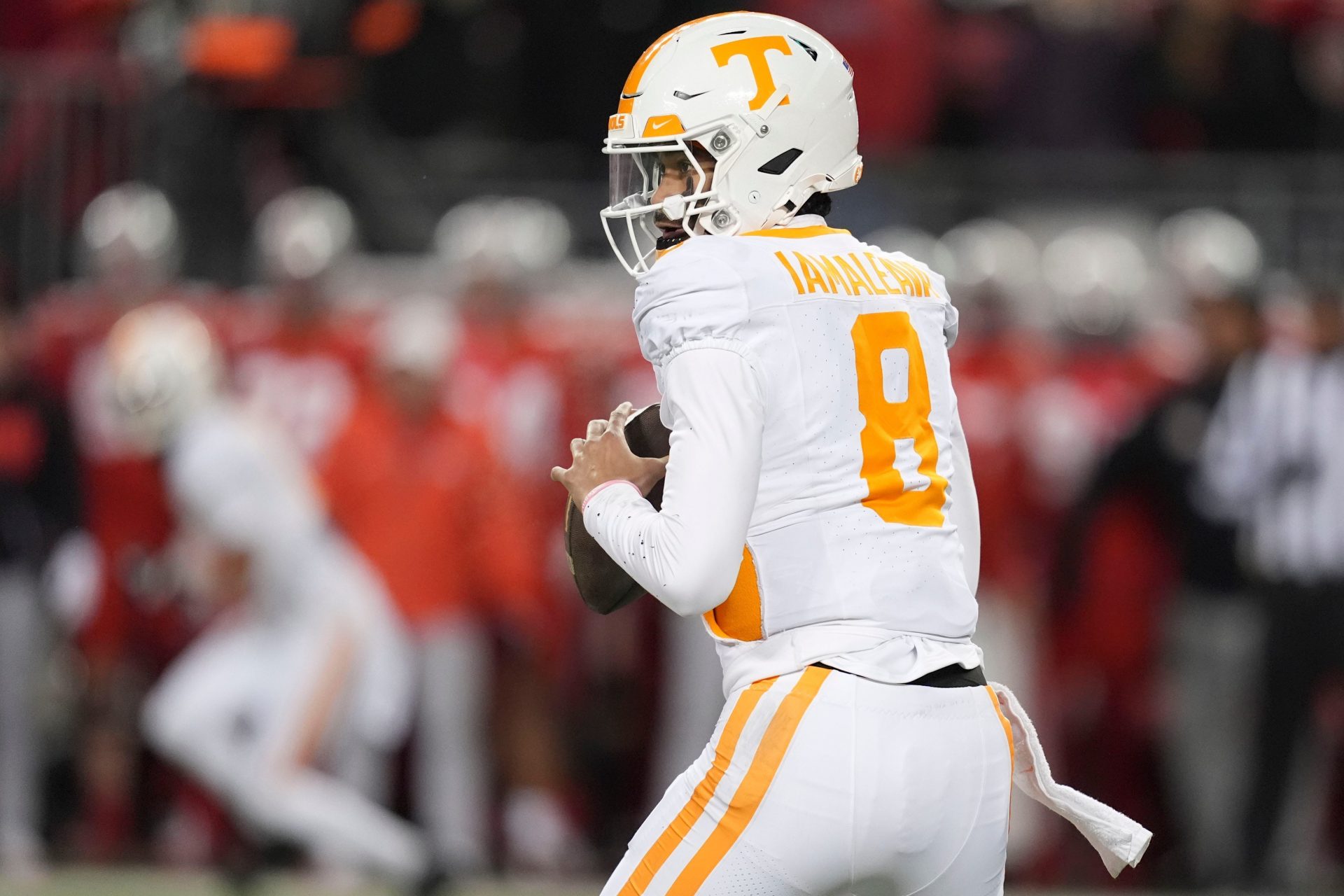 Tennessee quarterback Nico Iamaleava (8) looks for an open receiver during the NCAA college football playoff game against Ohio State on Saturday, Dec. 21, 2024, in Columbus, Ohio.
