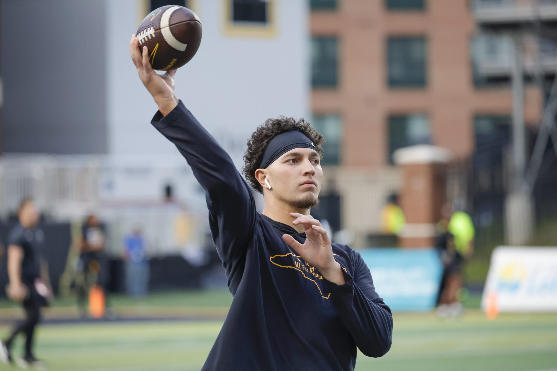 Appalachian State Mountaineers quarterback Joey Aguilar (4) throws a warmup pass before the game against the South Alabama Jaguars at Kidd Brewer Stadium.