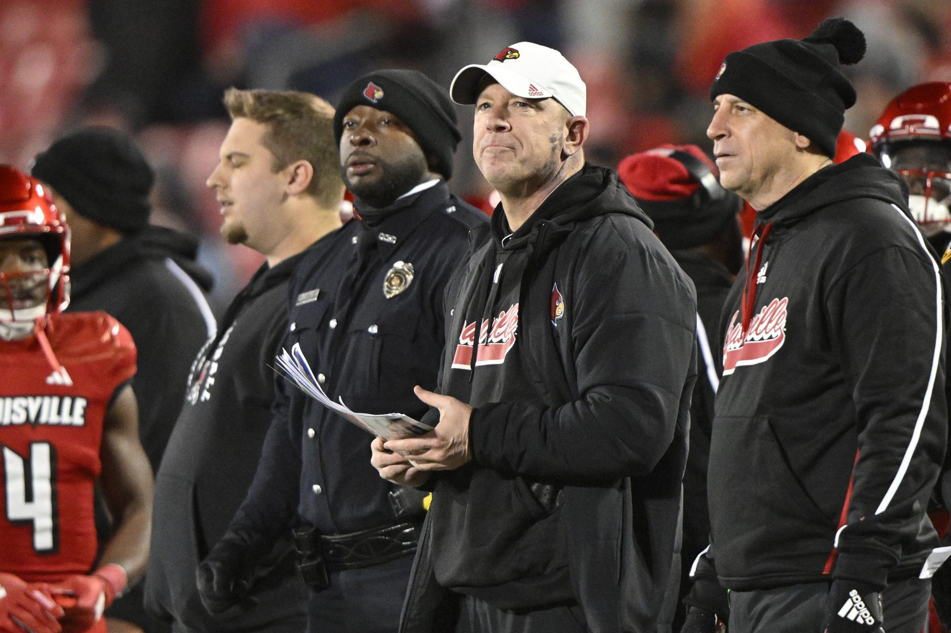 Louisville Cardinals head coach Jeff Brohm looks toward the scoreboard during the second half against the Pittsburgh Panthers at L&N Federal Credit Union Stadium. Louisville defeated Pittsburgh 37-9.