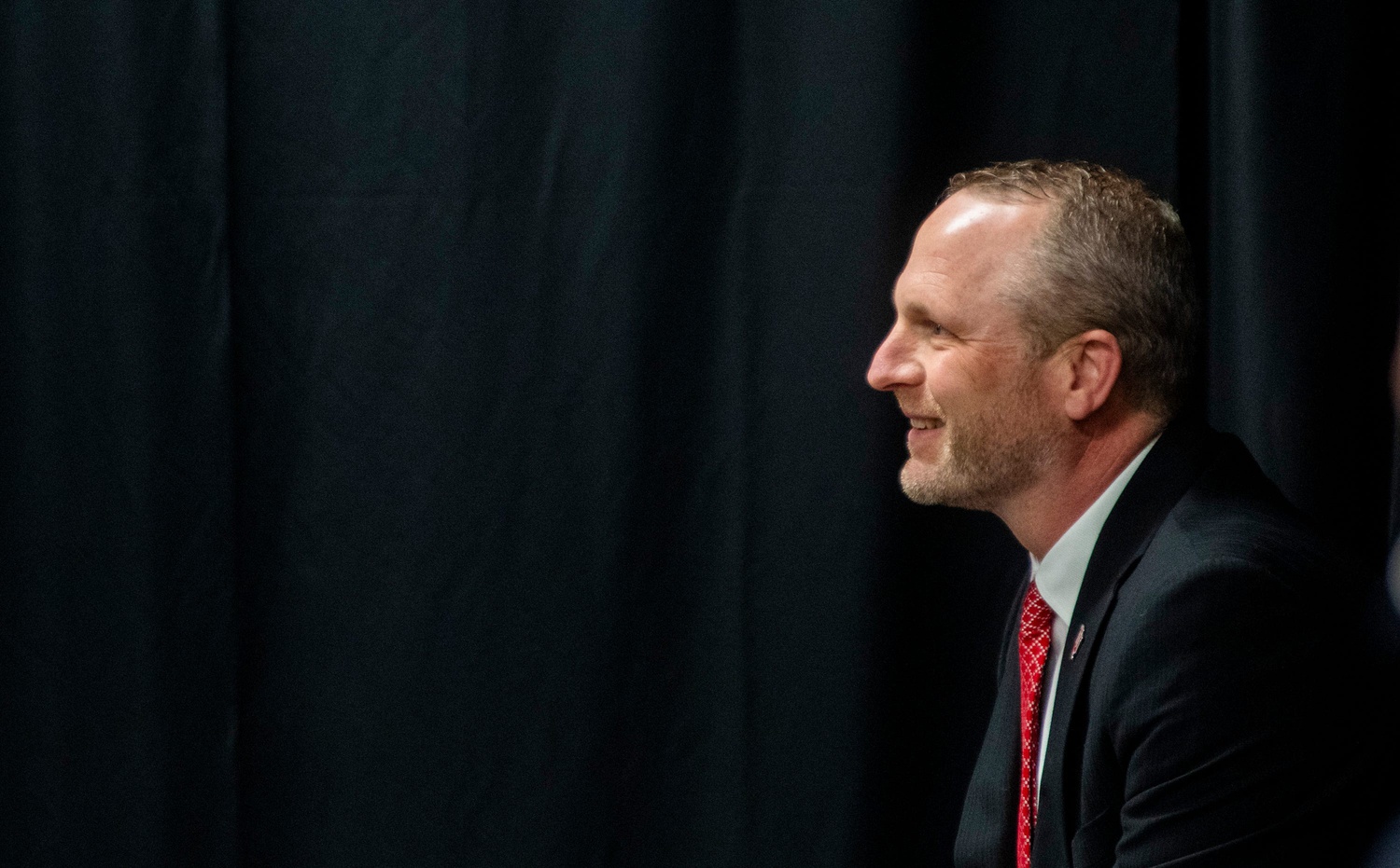 New Indiana University Men's Basketball Head Coach Darian DeVries waits to be introduced at the introductory press conference at Simon Skjodt Assembly Hall on Wednesday, March 19, 2025.