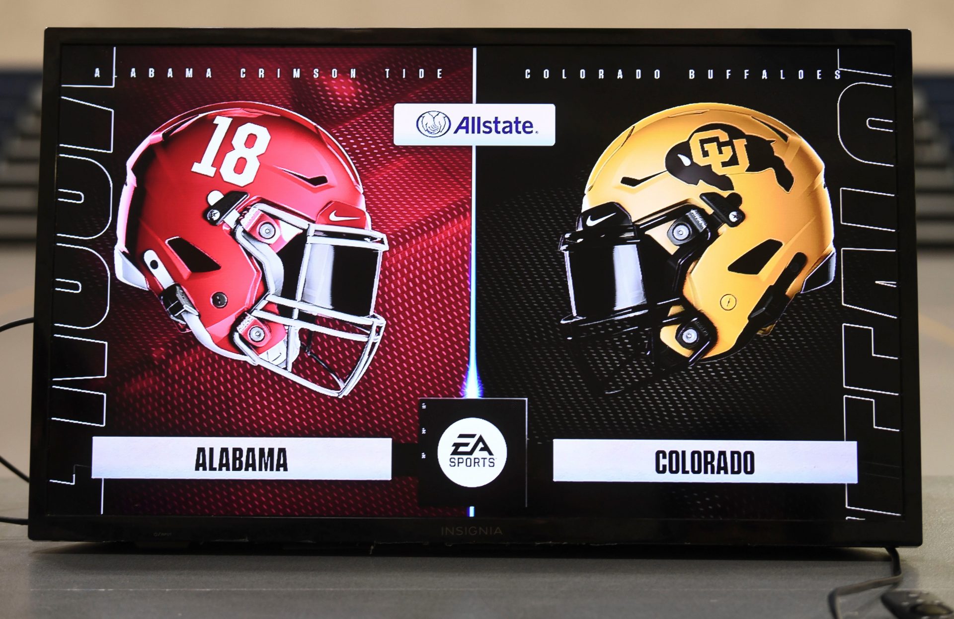 Kids play each other on the new EA Sports College Football 25 video game at the McDonald Hughes Center in Tuscaloosa.