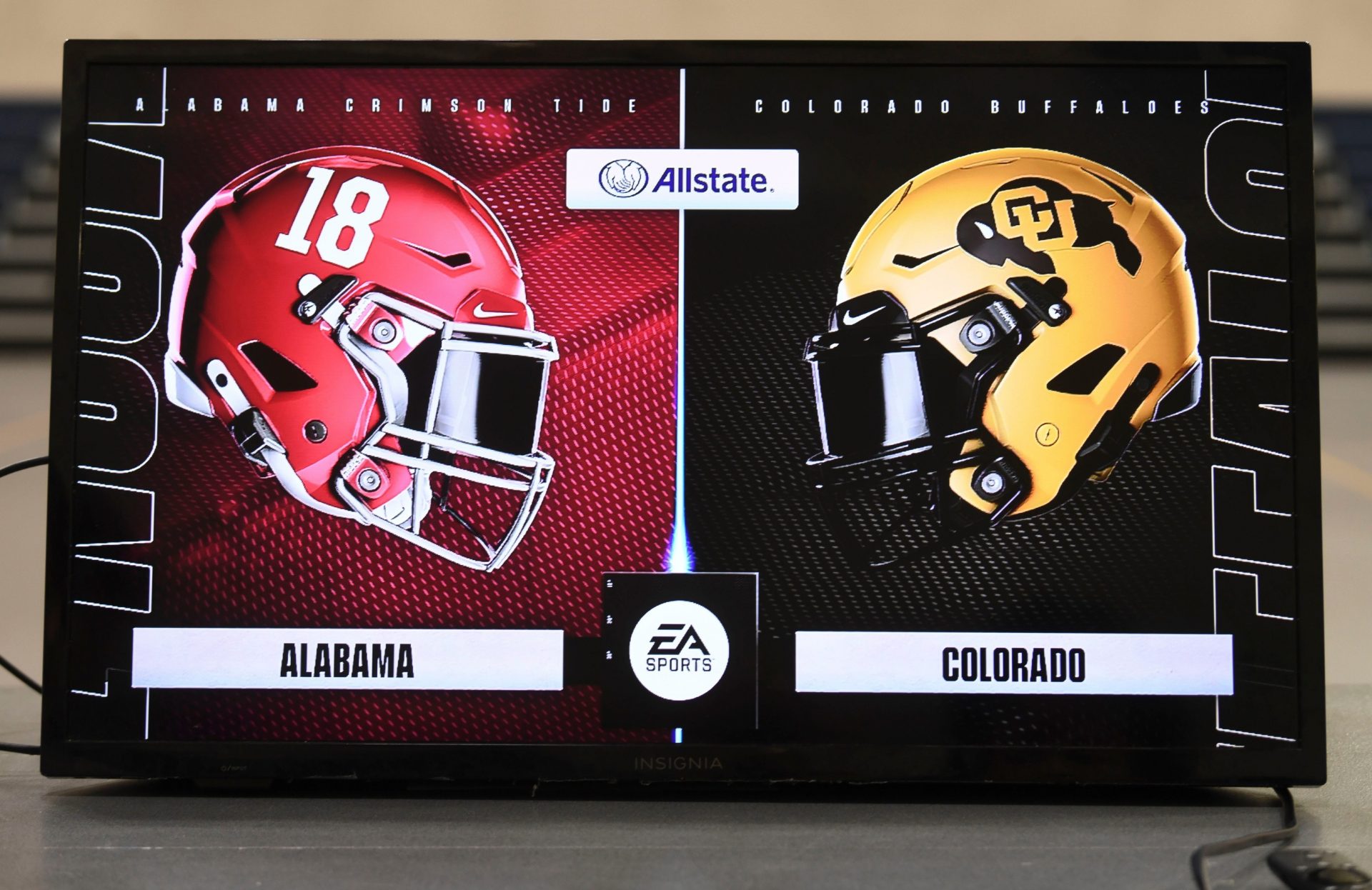 Kids play each other on the new EA Sports College Football 25 video game at the McDonald Hughes Center in Tuscaloosa.