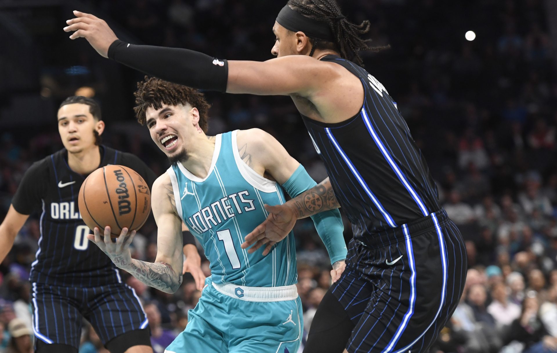 Charlotte Hornets guard LaMelo Ball (1) drives in during the second half against the Orlando Magic at the Spectrum Center.