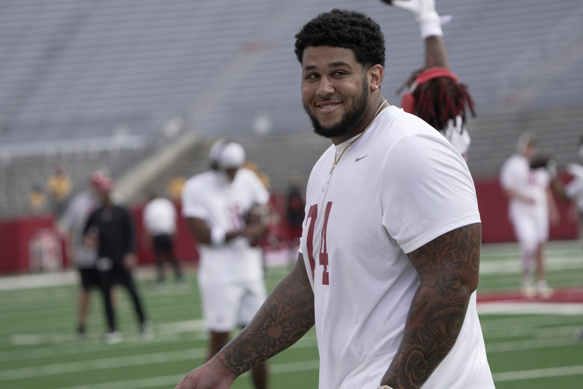 Alabama Crimson Tide offensive lineman Kadyn Proctor (74) is shown before a game against the Wisconsin Badgers at Camp Randall Stadium.