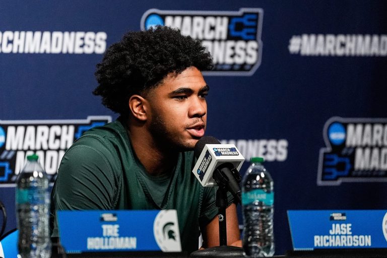 Michigan State guard Jase Richardson (11) answers a question at a press conference ahead of Second Round of NCAA Tournament against New Mexico at Rocket Arena in Cleveland, Ohio on Saturday, March 22, 2025.