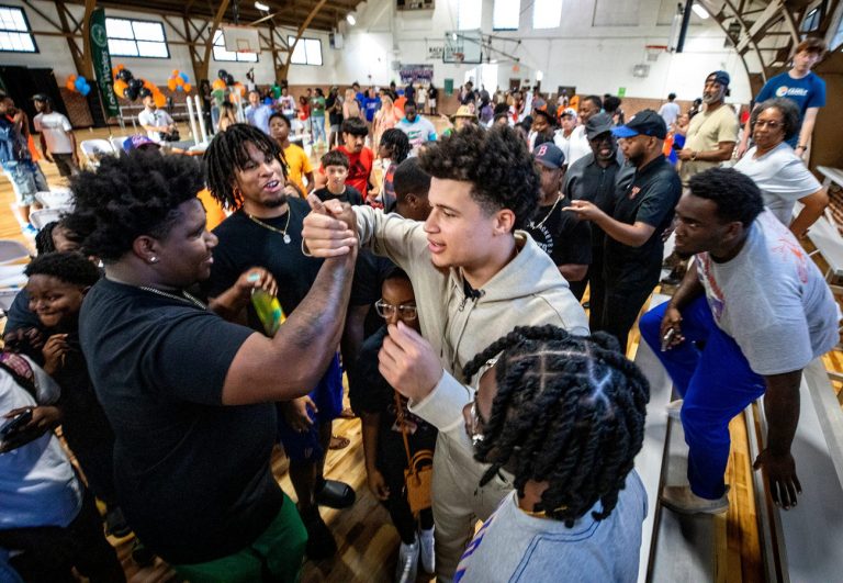 University of Florida basketball player, Walter Clayton Jr. mingles with the crowd after the City of Lake Wales' ribbon-cutting ceremony at Albert Kirkland Gymnasium Friday April 18 , 2025 in Lake Wales Fl. 
Ernst Peters/The Ledger
