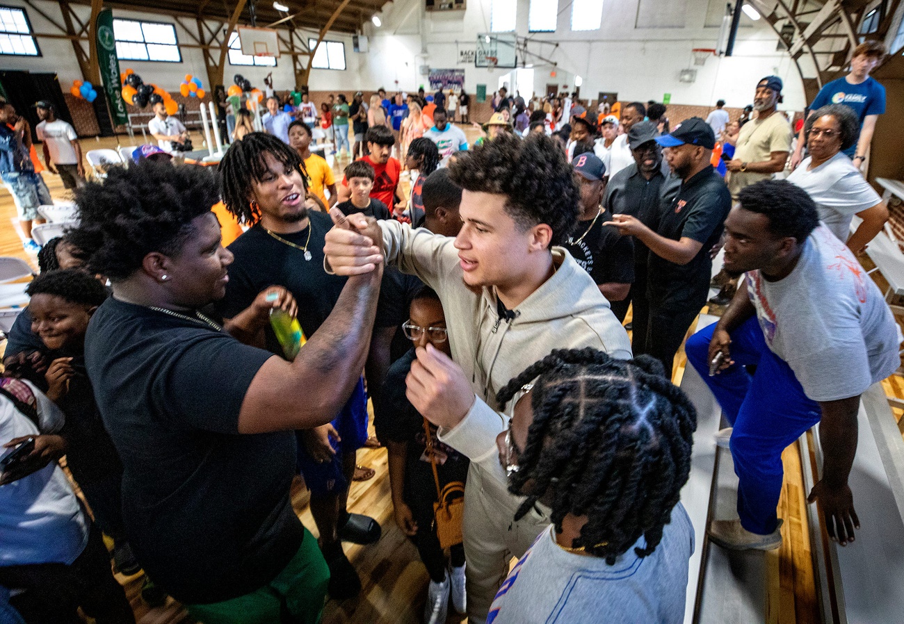 University of Florida basketball player, Walter Clayton Jr. mingles with the crowd after the City of Lake Wales' ribbon-cutting ceremony at Albert Kirkland Gymnasium Friday April 18 , 2025 in Lake Wales Fl. 
Ernst Peters/The Ledger