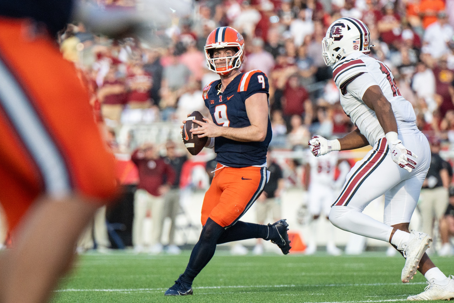 Illinois Fighting Illini quarterback Luke Altmyer (9) gets ready to throw the ball against the South Carolina Gamecocks in the first quarter at Camping World Stadium.