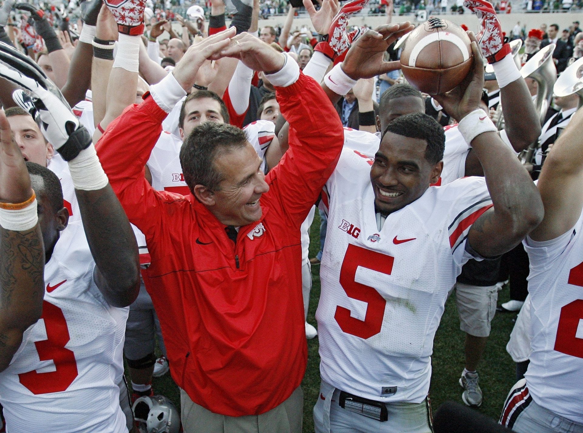 Urban Meyer came to love star quarterback Braxton Miller (5) and the rest of the 2012 Buckeyes, and to this day does not understand why they were punished for NCAA violations committed by predecessors.