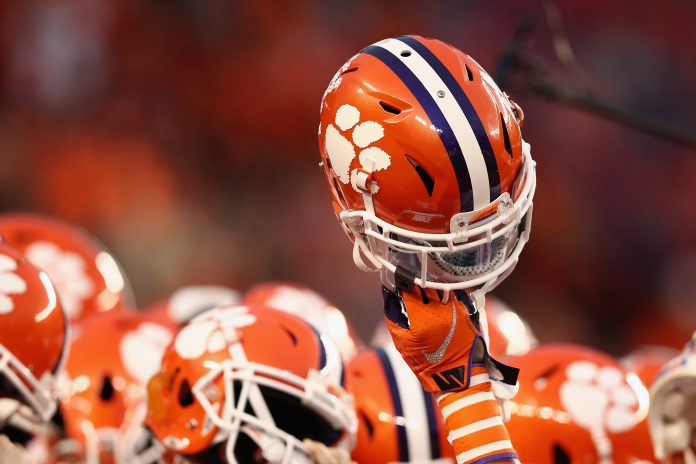 SANTA CLARA, CA - JANUARY 07:  A Clemson Tigers helmet is held up prior to the CFP National Championship against the Alabama Crimson Tide presented by AT&T at Levi's Stadium on January 7, 2019 in Santa Clara, California.  (Photo by Ezra Shaw/Getty Images)