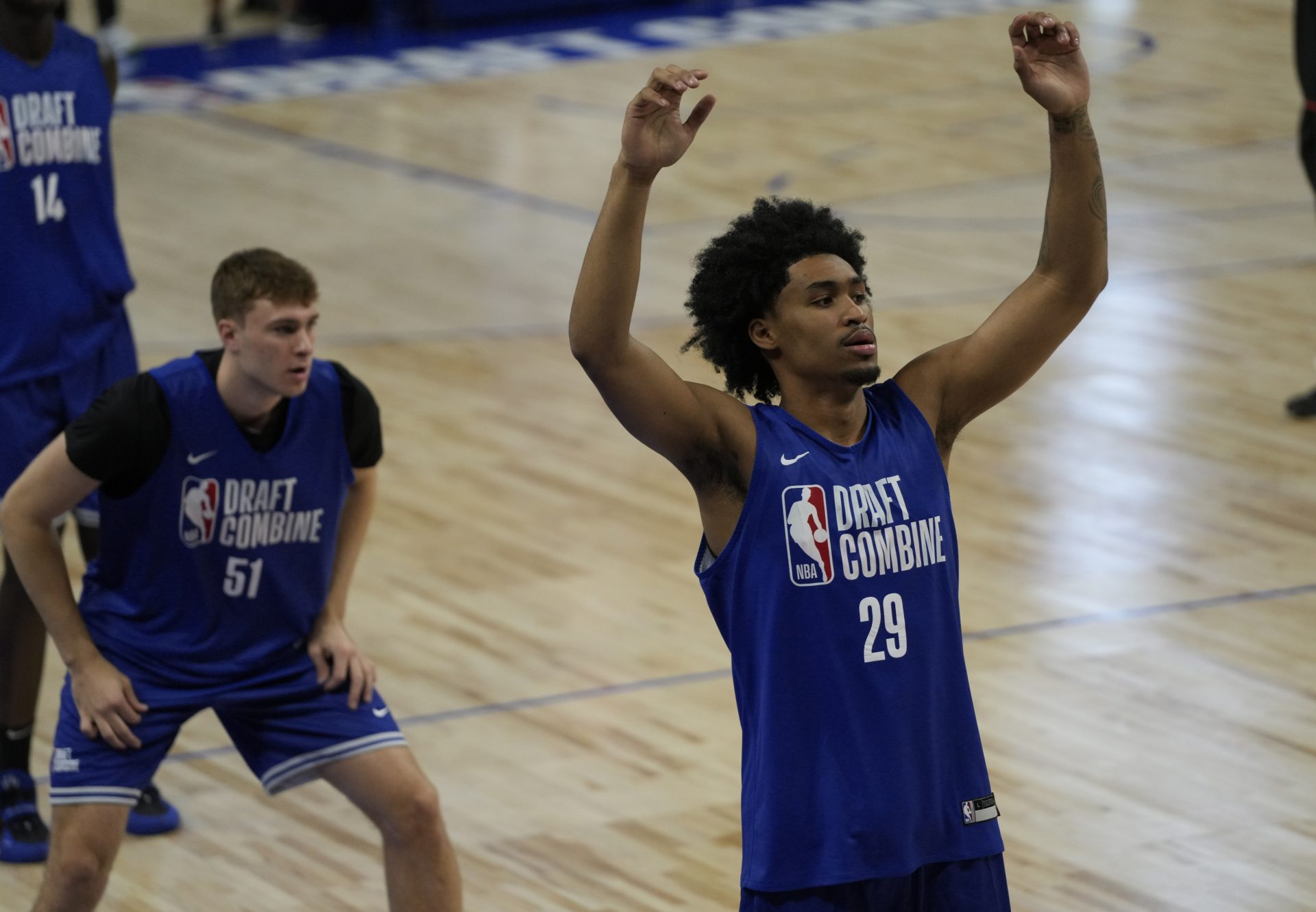 Dylan Harper (29) and Cooper Flagg (51) participates in the 2025 NBA Draft Combine at Wintrust Arena.