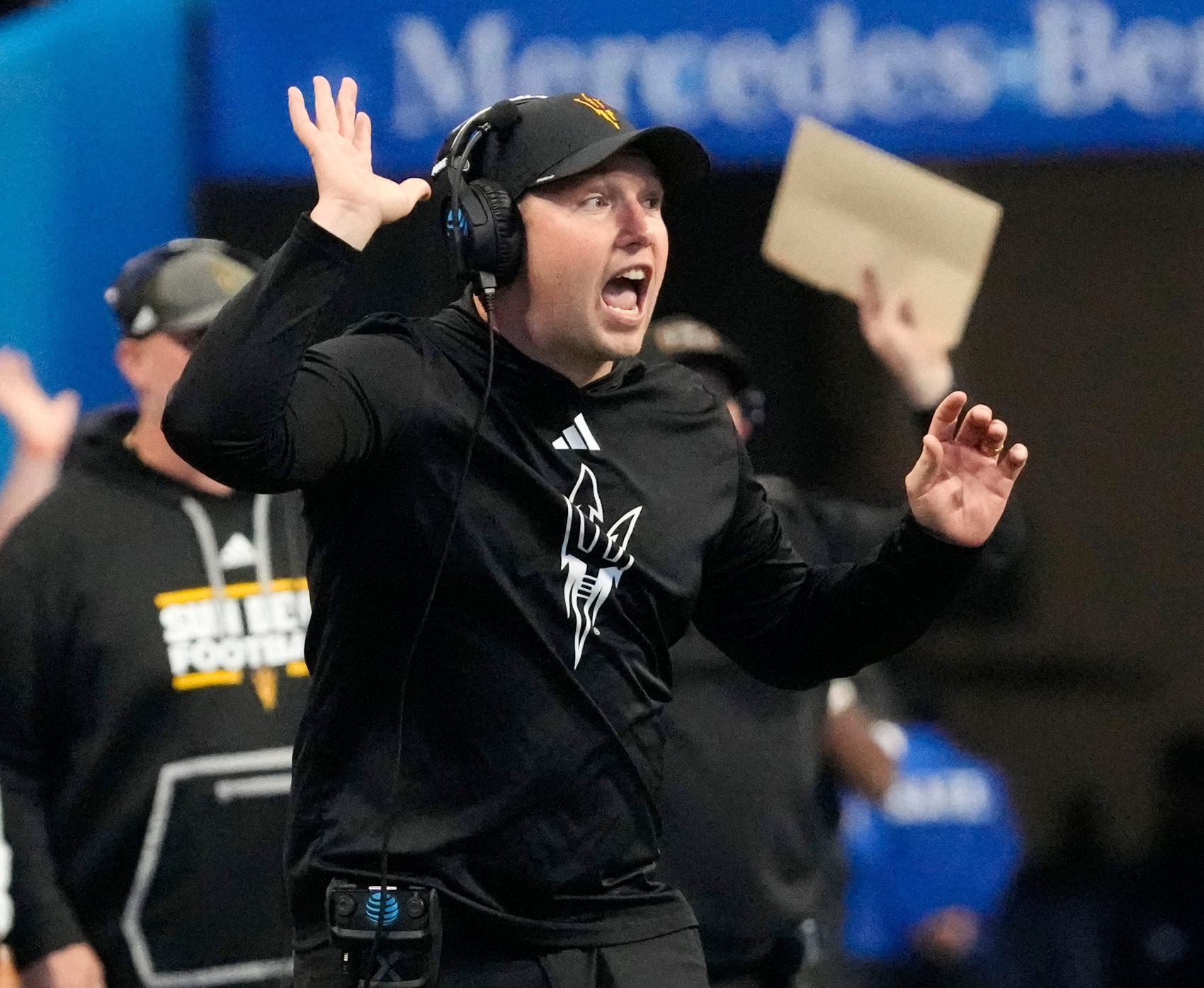 Arizona State head coach Kenny Dillingham calls a play against Texas during the fourth quarter in the Chick-fil-A Peach Bowl in Atlanta on Wednesday, Jan. 1, 2025.