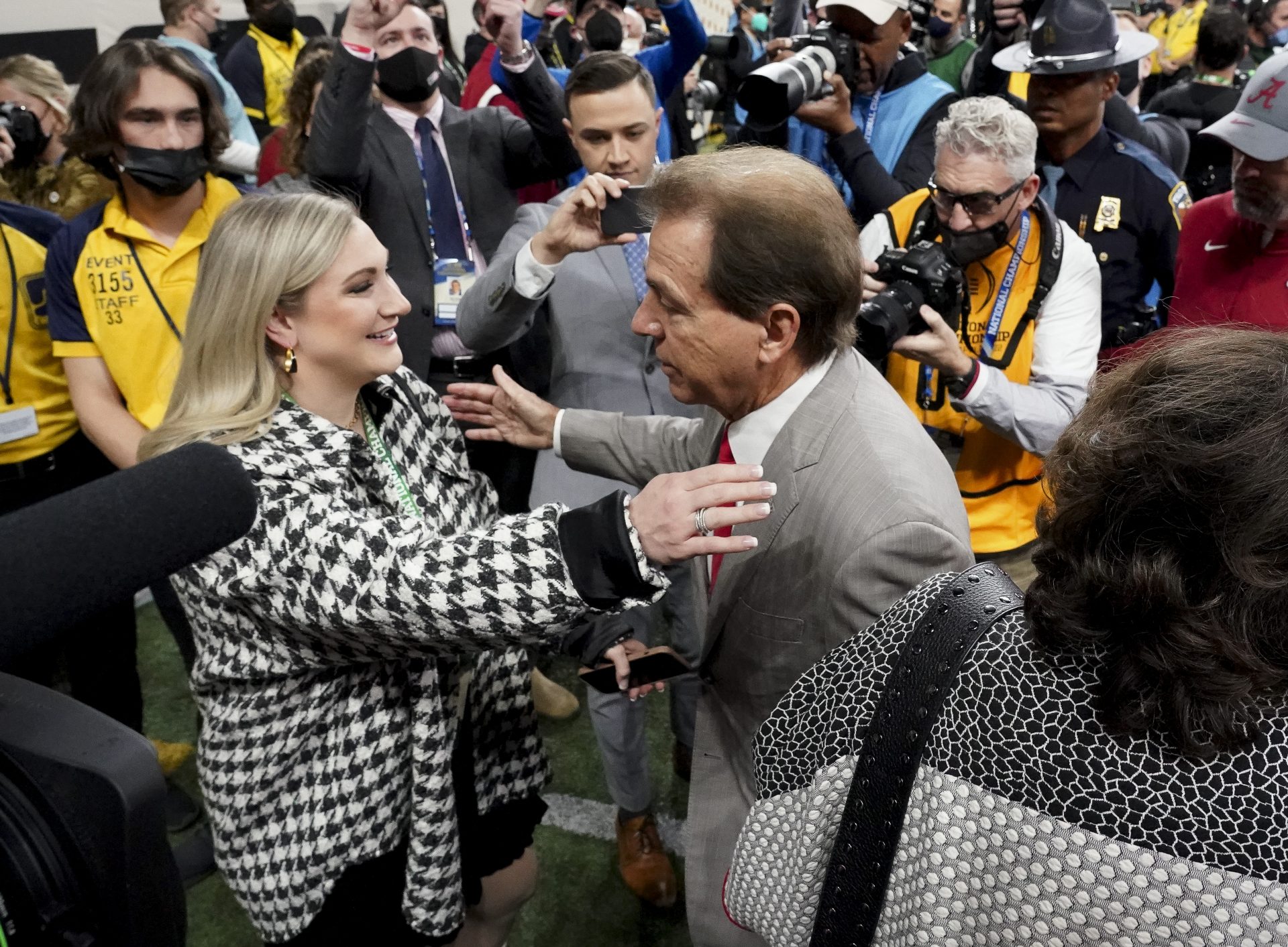 Alabama head coach Nick Saban embraces his daughter, Kristen Saban Setas, before the 2022 CFP college football national championship game against Georgia at Lucas Oil Stadium.