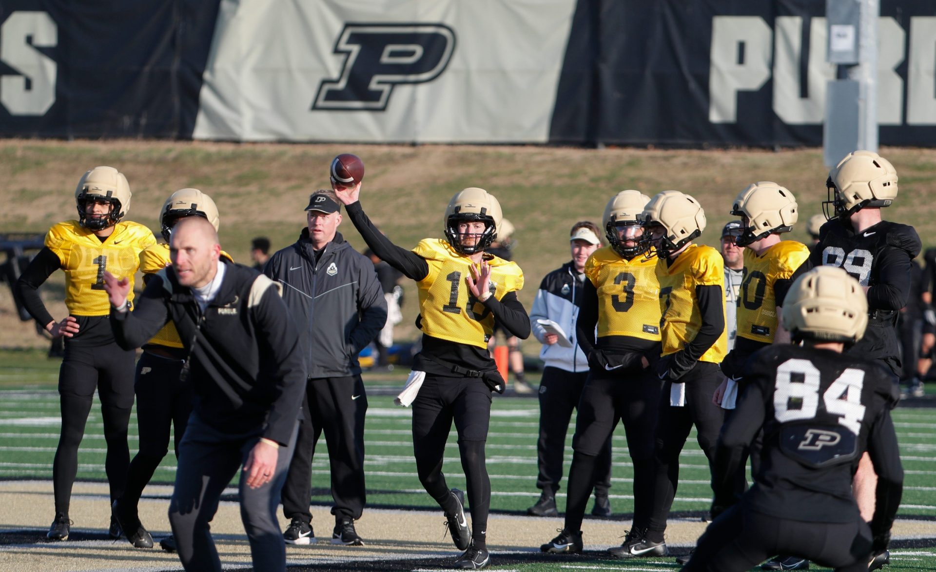 Purdue Boilermakers quarterback Bennett Meredith (18) passes the ball to Purdue Boilermakers wide receiver Nolan Buckman (84) Tuesday, April 1, 2025, during football practice at Kozuch Football Performance Complex in West Lafayette, Ind.