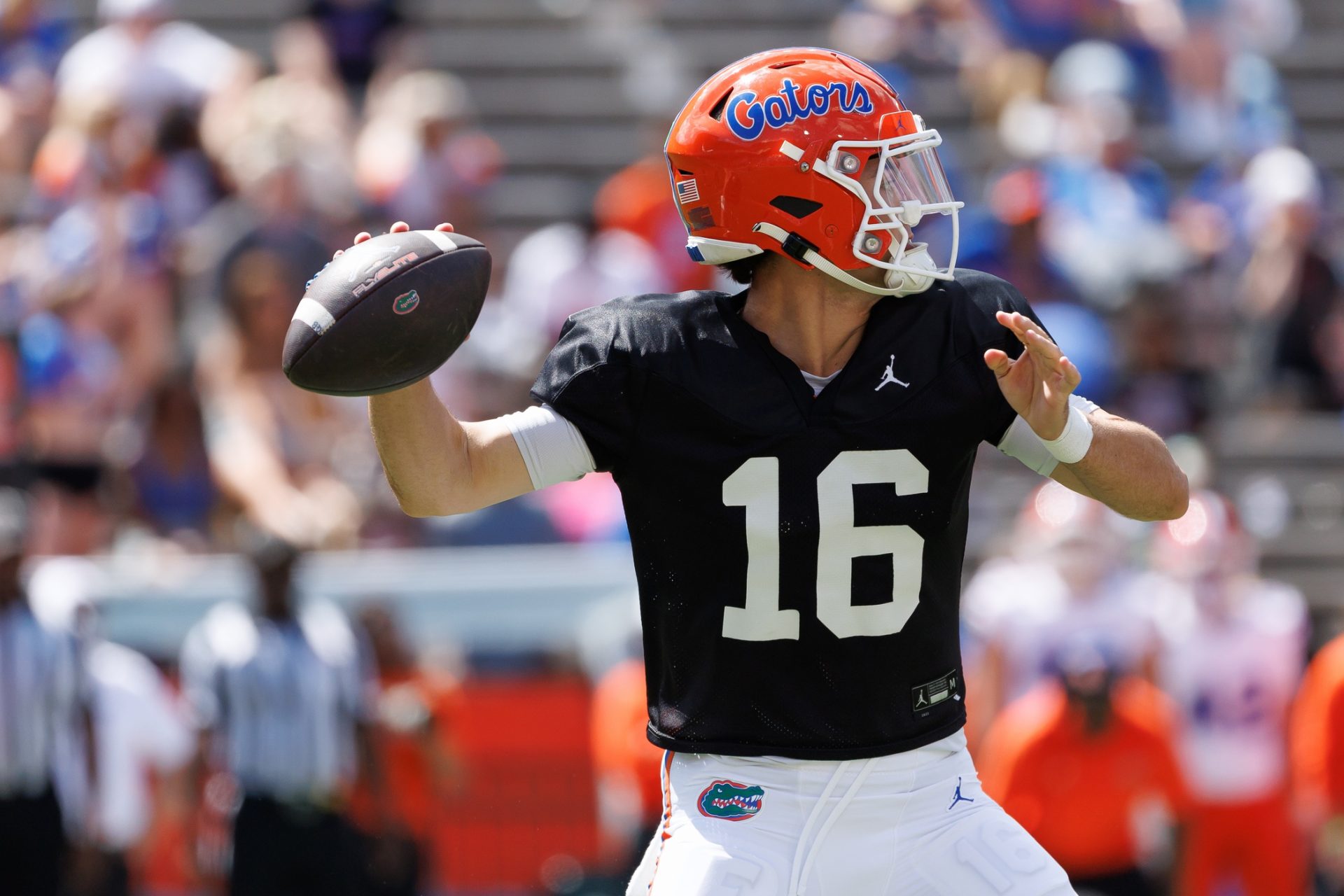 Florida Gators quarterback Aidan Warner (16) throws the ball during the second half at Ben Hill Griffin Stadium.