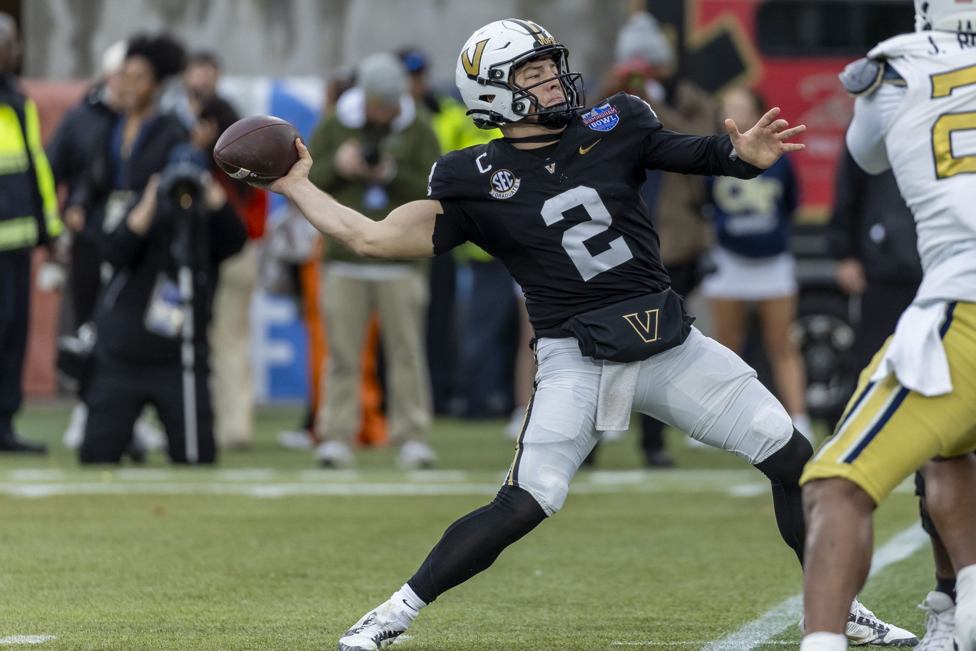 Vanderbilt Commodores quarterback Diego Pavia (2) throws the ball against the Georgia Tech Yellow Jackets during the first half of the 2024 Birmingham Bowl at Protective Stadium.